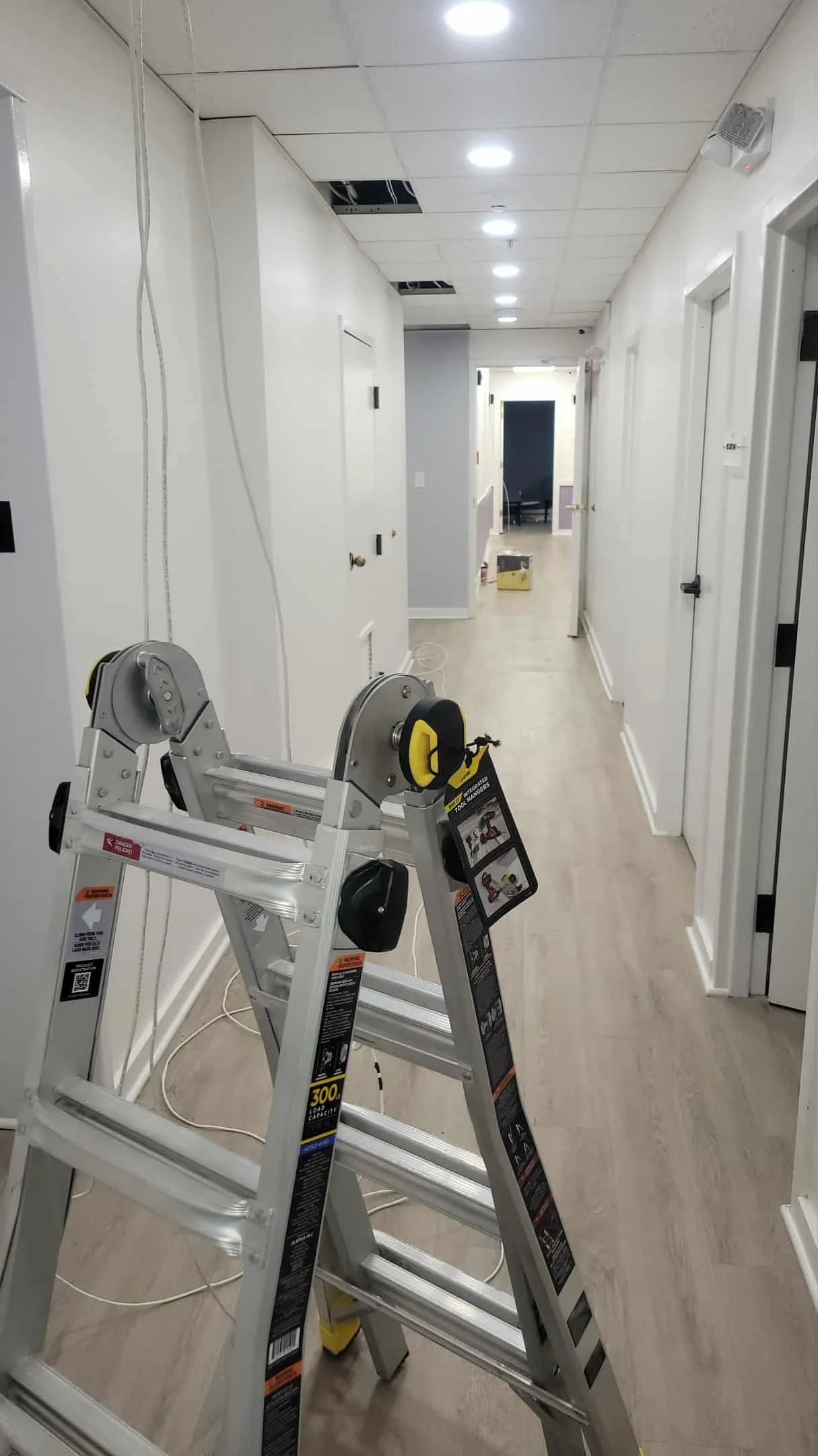 installed recessed lights and security camera for a health business in newton ma