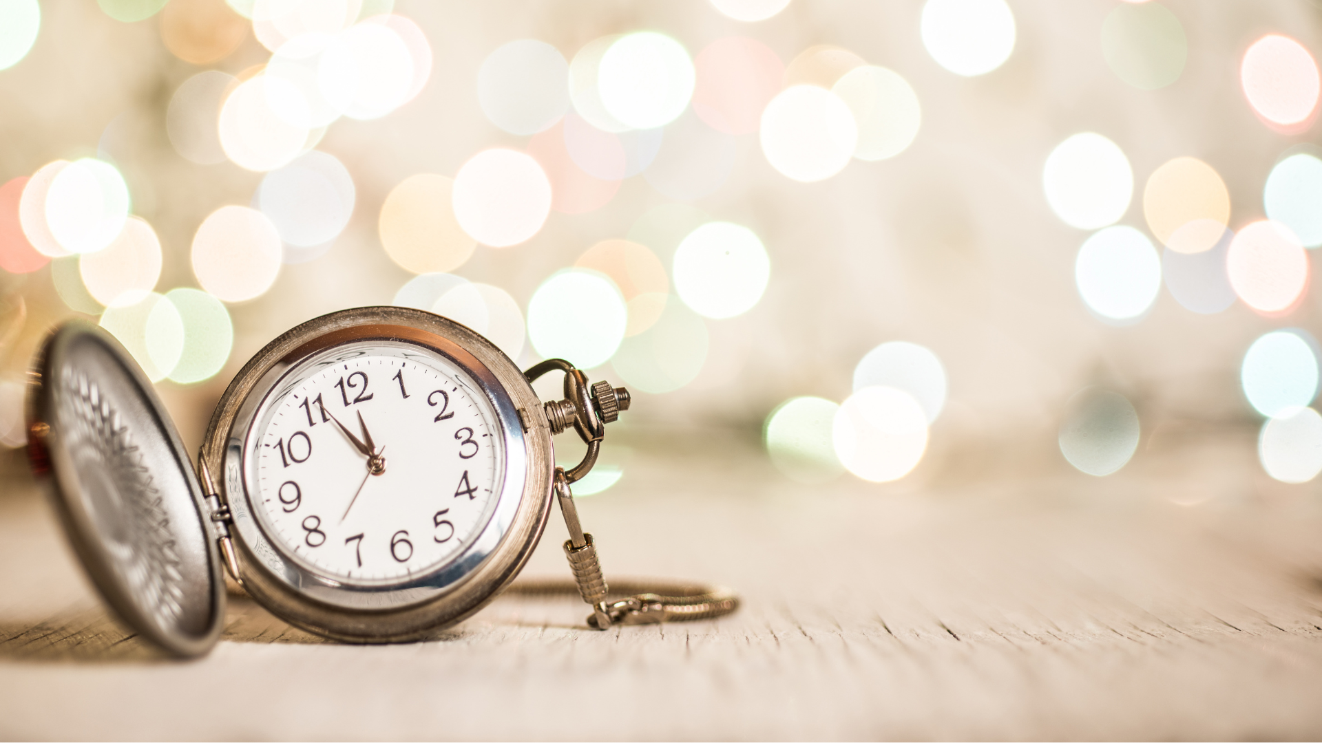 A sparkling background with a clock almost at midnight. New Years Eve/ New Years