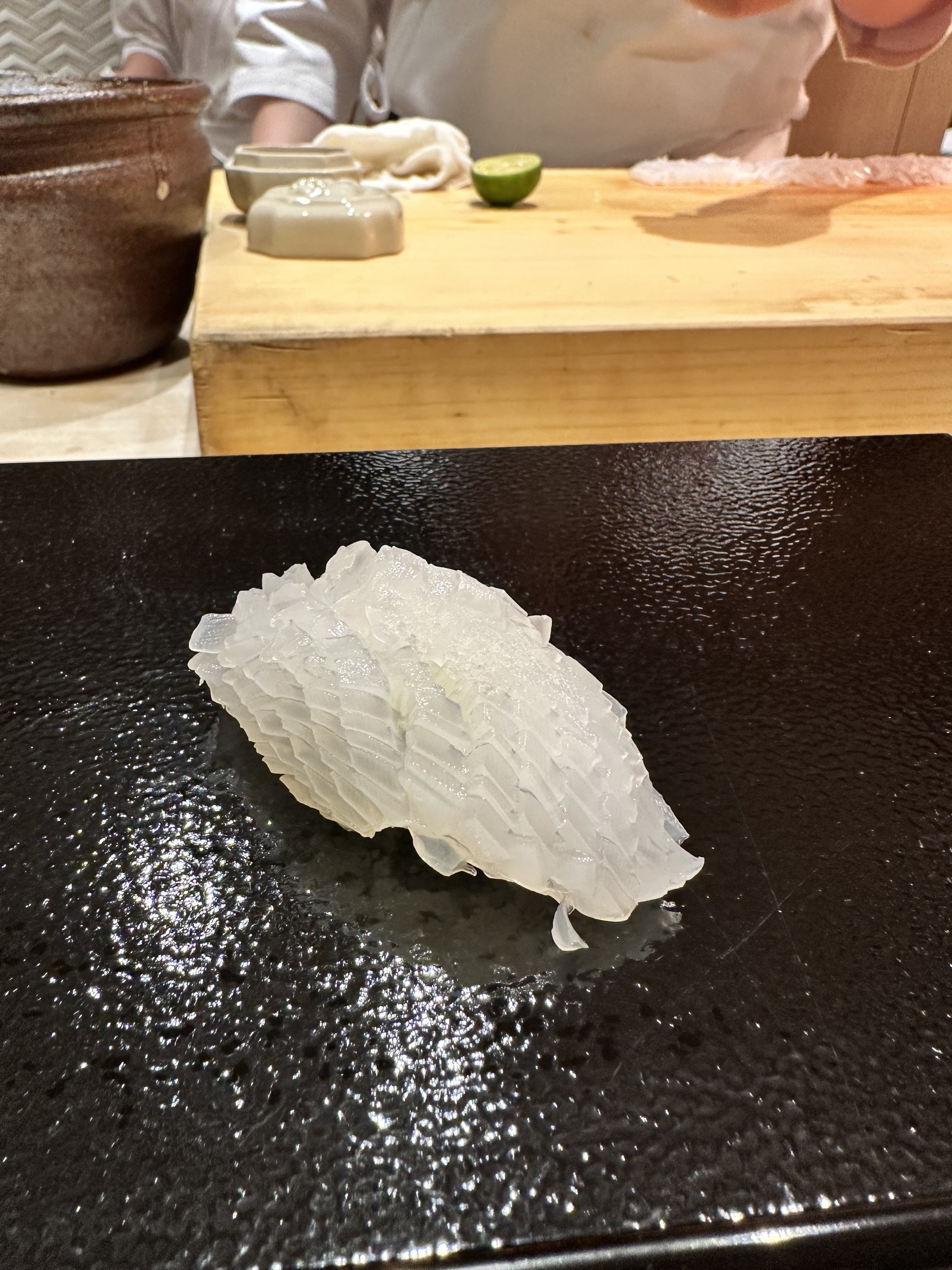 Akira Sushi Ika Nigiri with different cut.jpeg