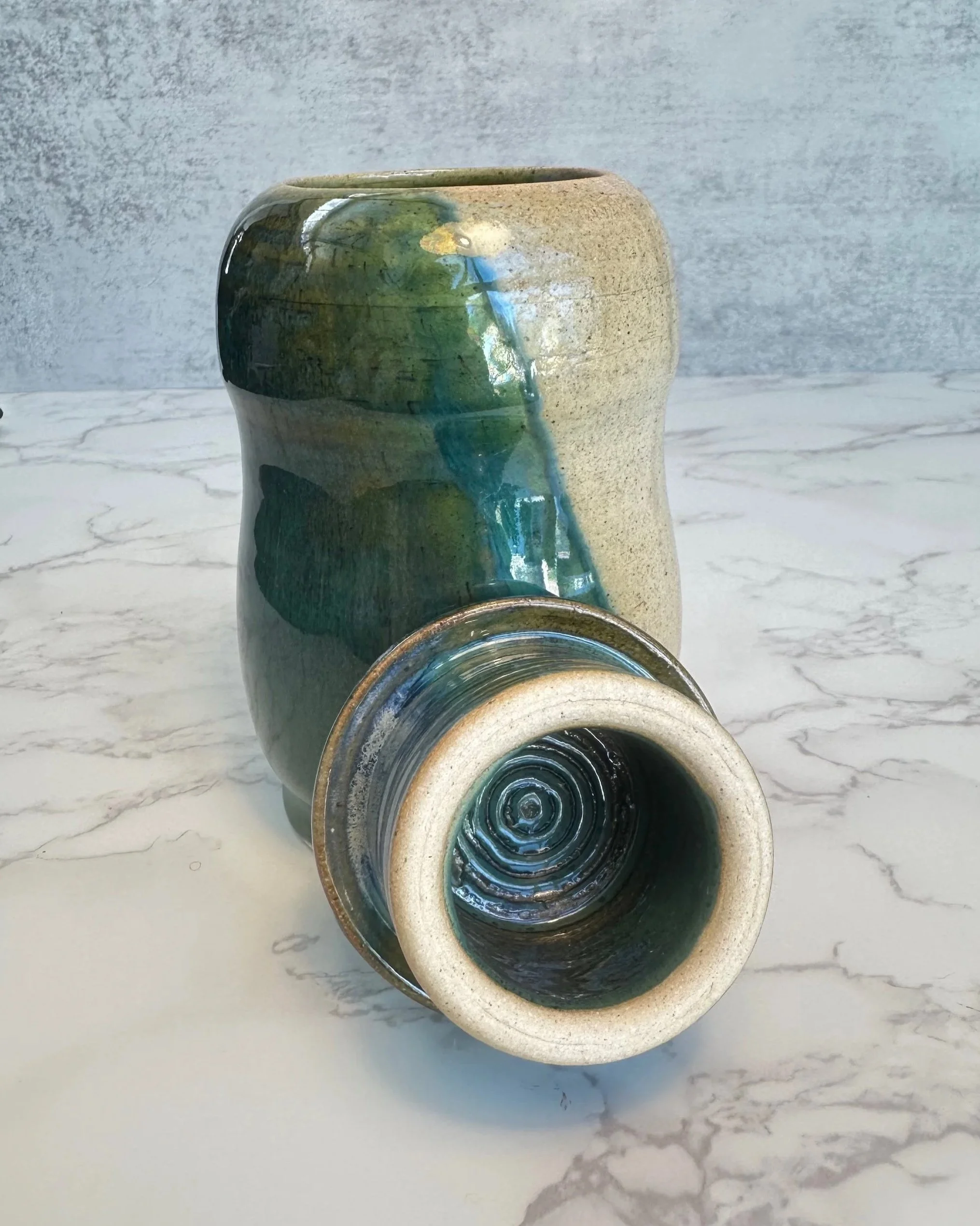 Handmade clay lidded jar with penguin-like shape and cone 6 glaze by Tabula Rasa Clay.