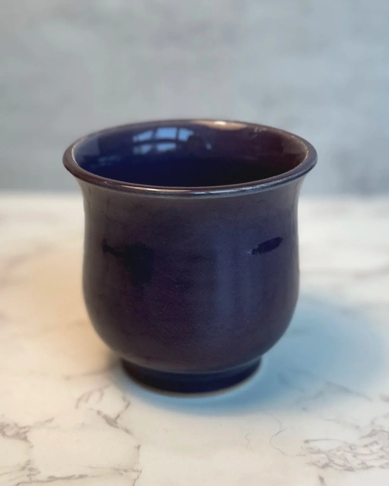Handmade ceramic planter in deep plum glaze