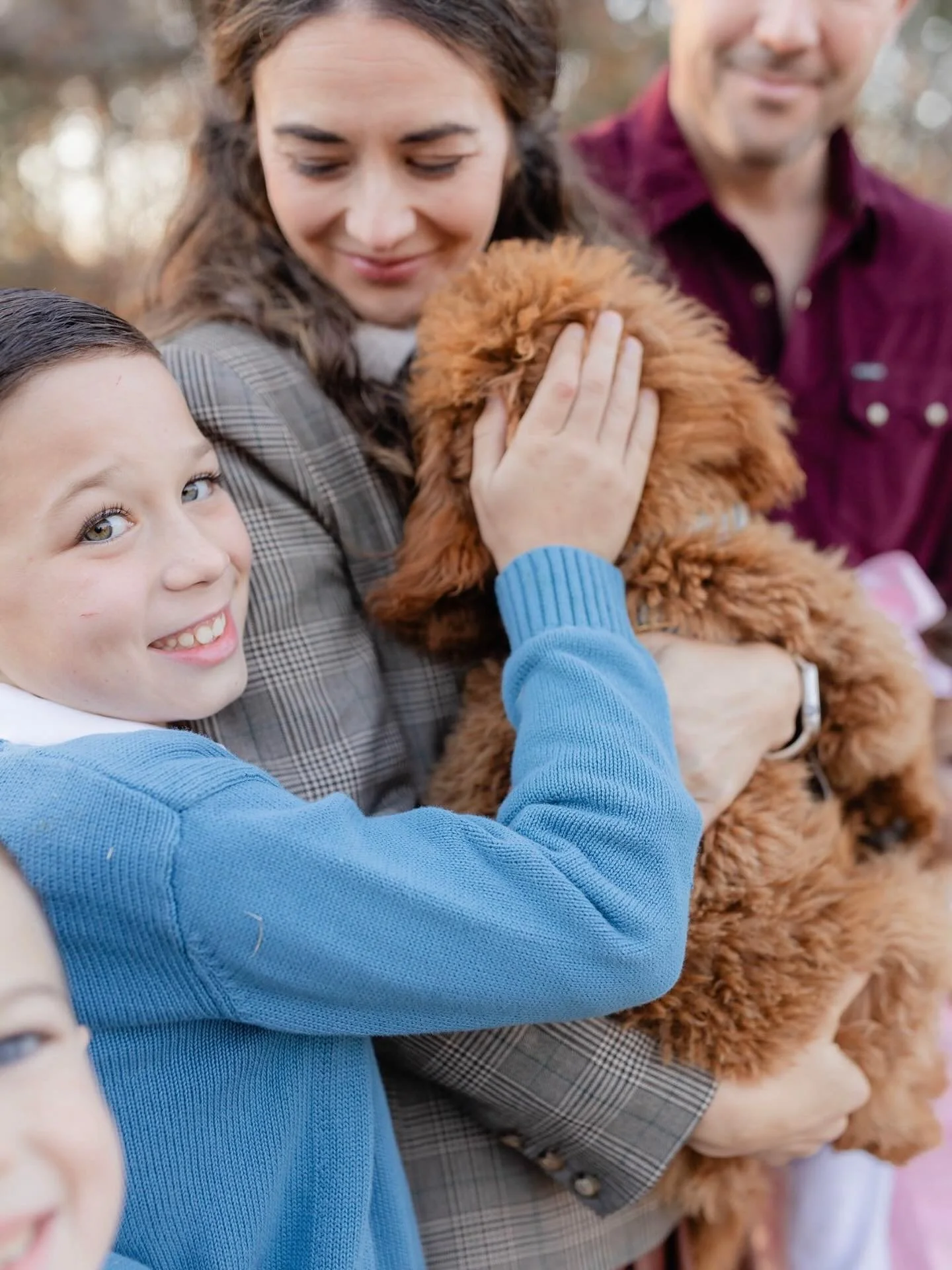 Dogs are always considered a part of the family in family photos! 🐶