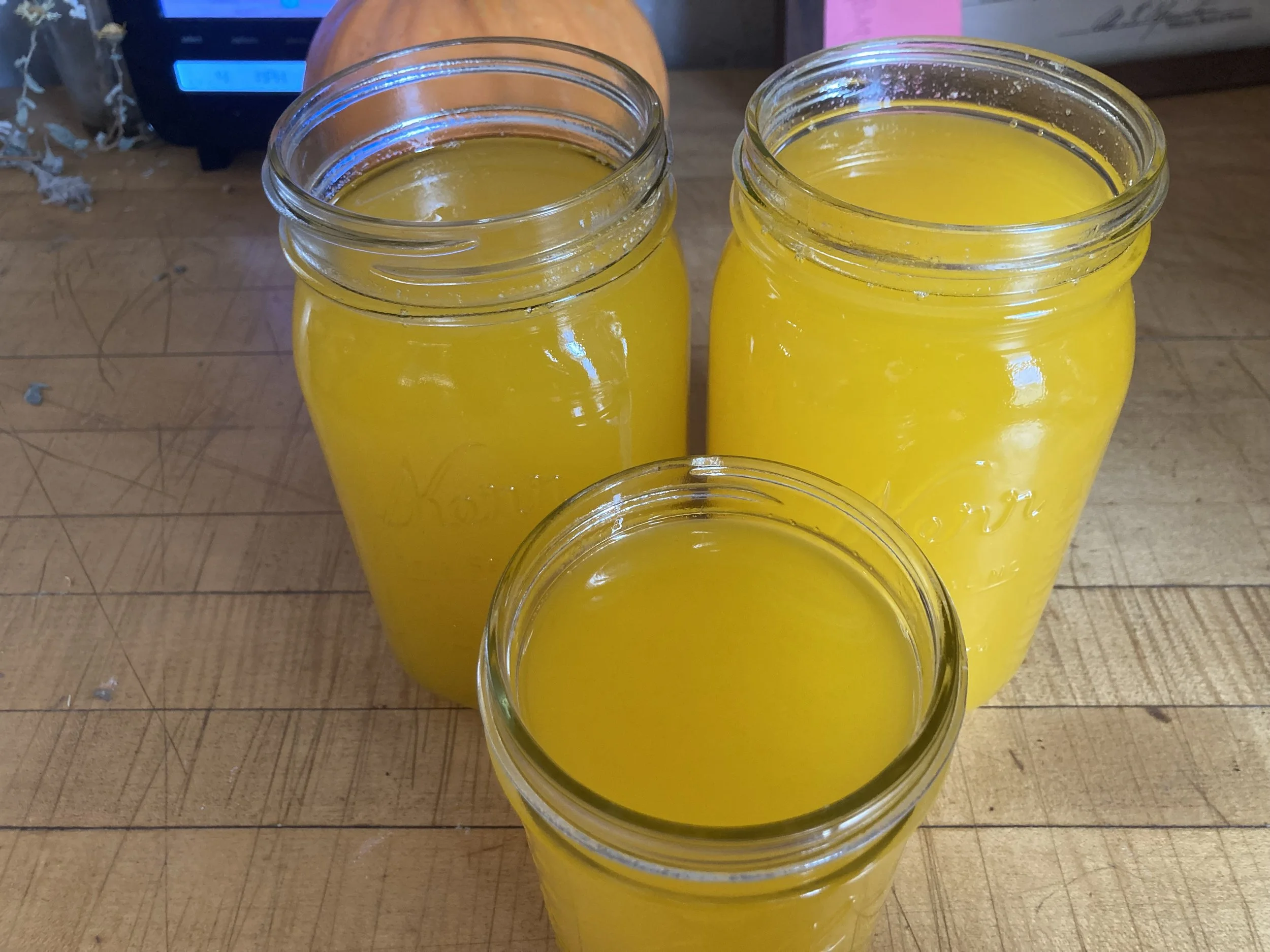 rendered ghee cooling in jars