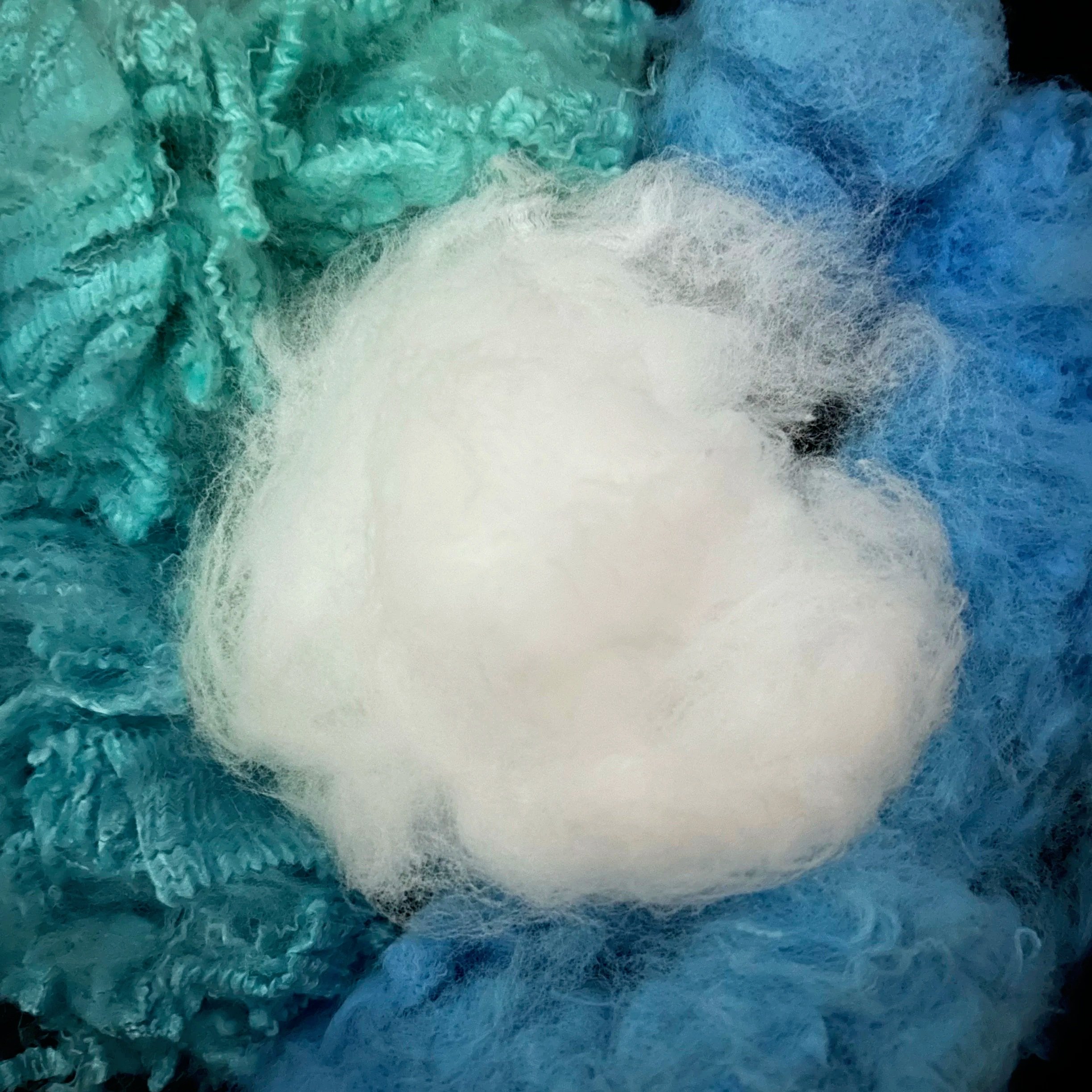 INNOVATIVE FIBERS. UNIQUE POLYMERS, SHAPES, AND FINISHES 0.6 DENIER 15 DENIER CUT LENGTHS 22MM 38MM 51MM 64MM