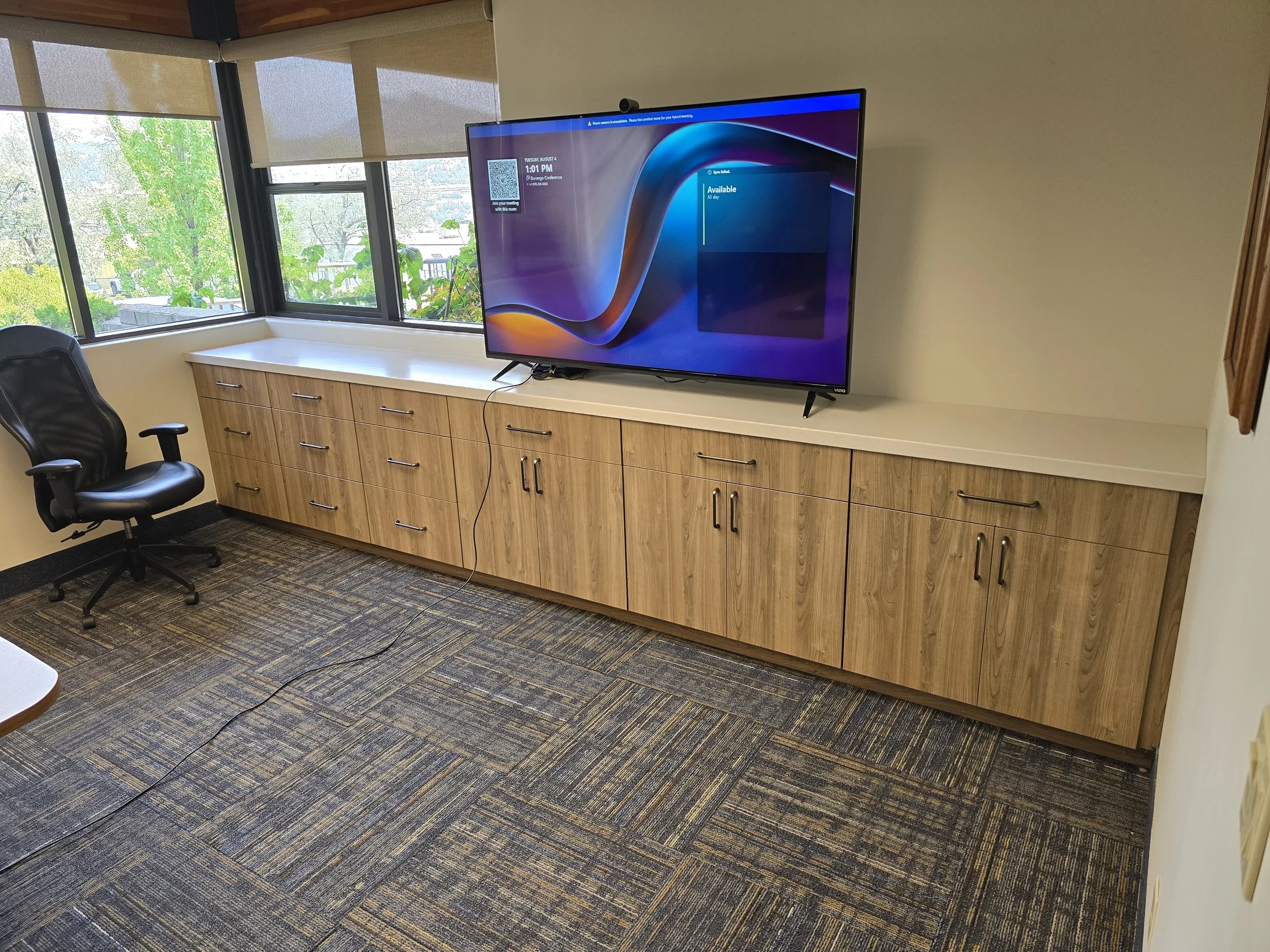 Custom Conference Room Cabinetry. Putting your best face forward for client meetings with Animas Kitchen & Bath cabinetry design.