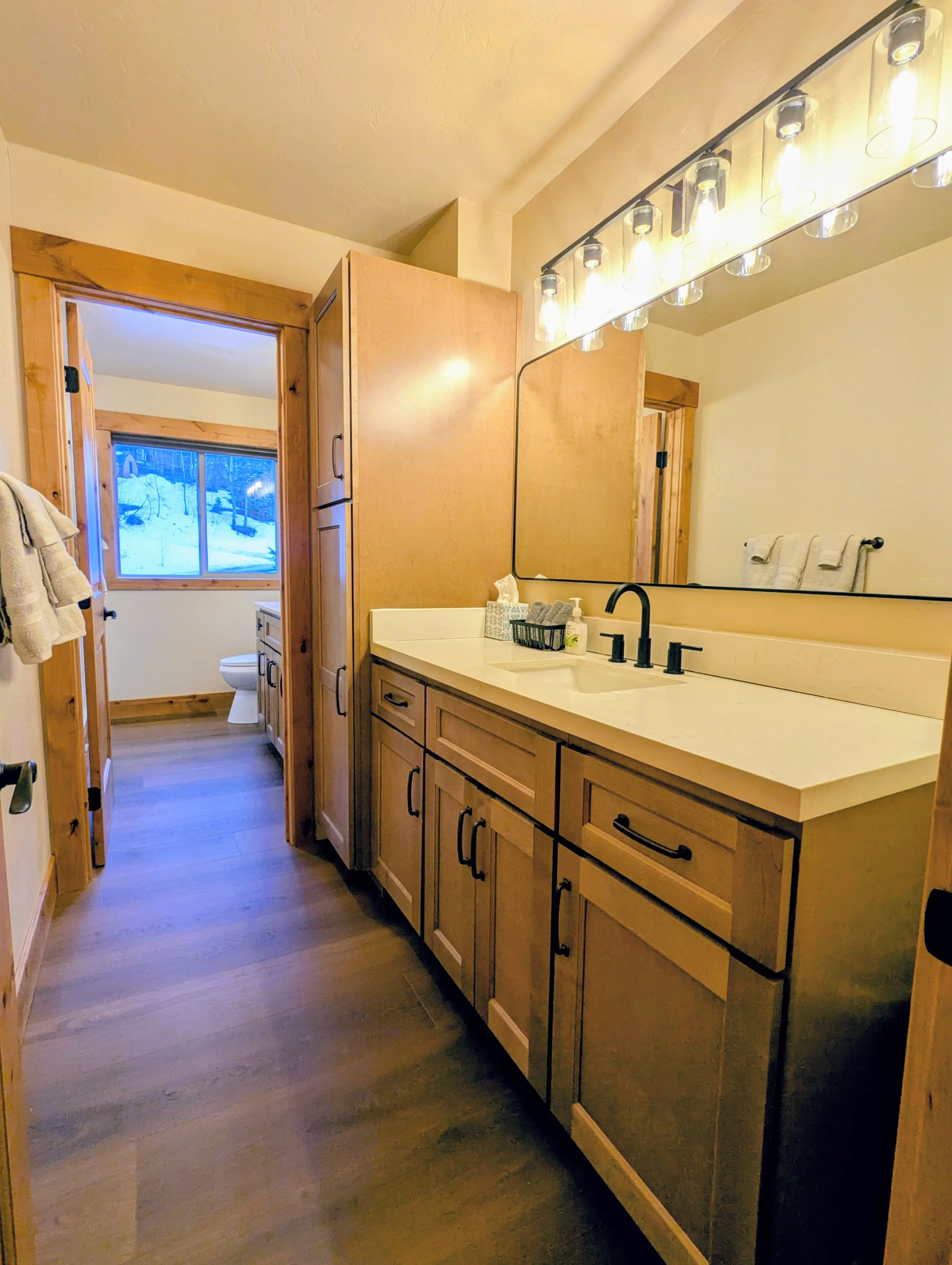 Durable bathroom for a short-term rental property. Looks great and built to last cabinets.