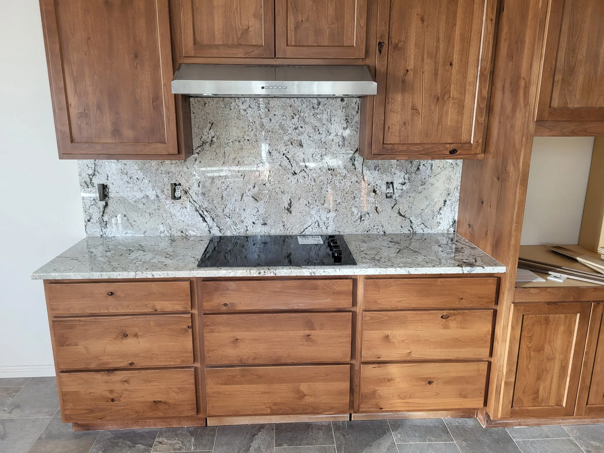 Beautiful Alder Kitchen Cabinets. Design and installation services.