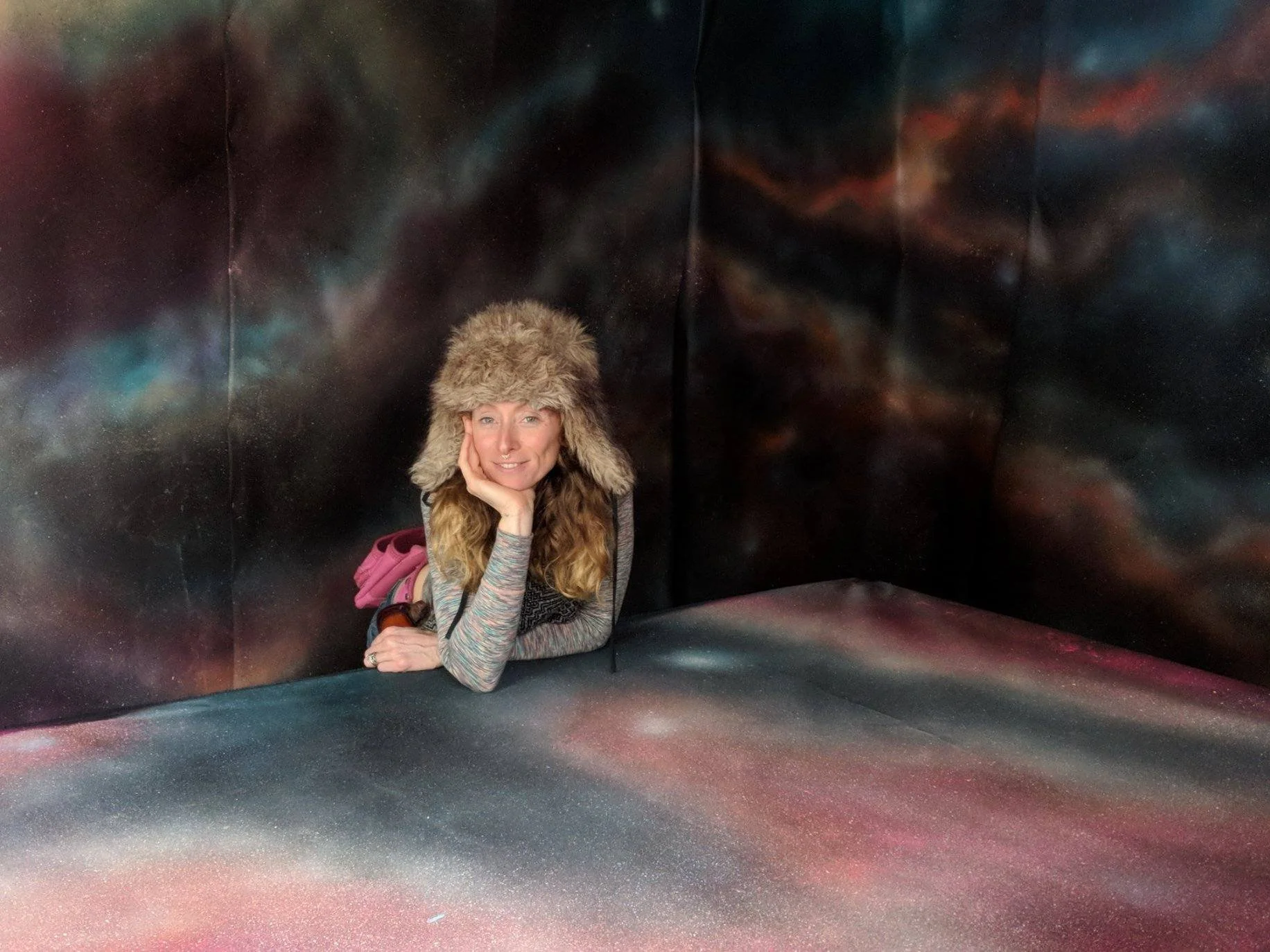 Heather painting galaxies banyan.jpg