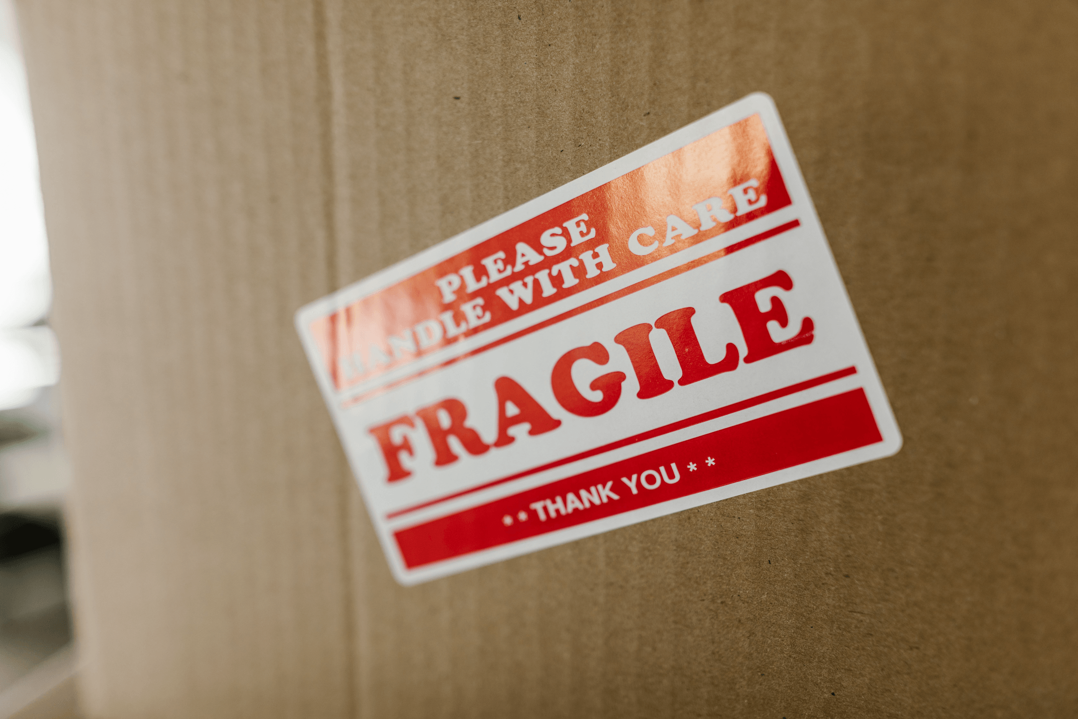 Box with a fragile sticker on it.