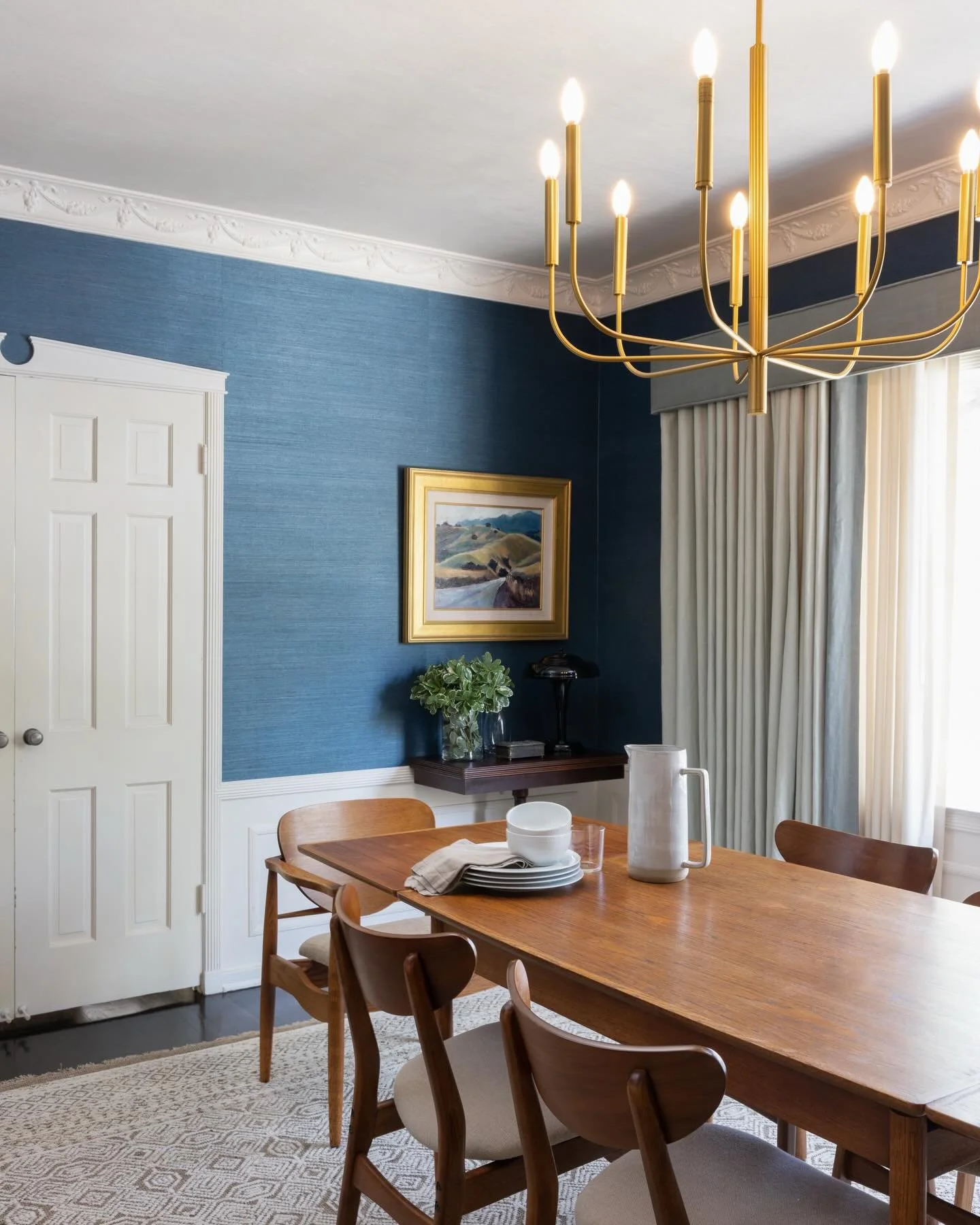 This 1939 Old Hollywood home had the kind of character that is tough to recreate, original moulding, built-ins, and all the good bones.  One of our favorite spots? A hidden, Prohibition-style wet bar tucked right into the family room.  We layered in 