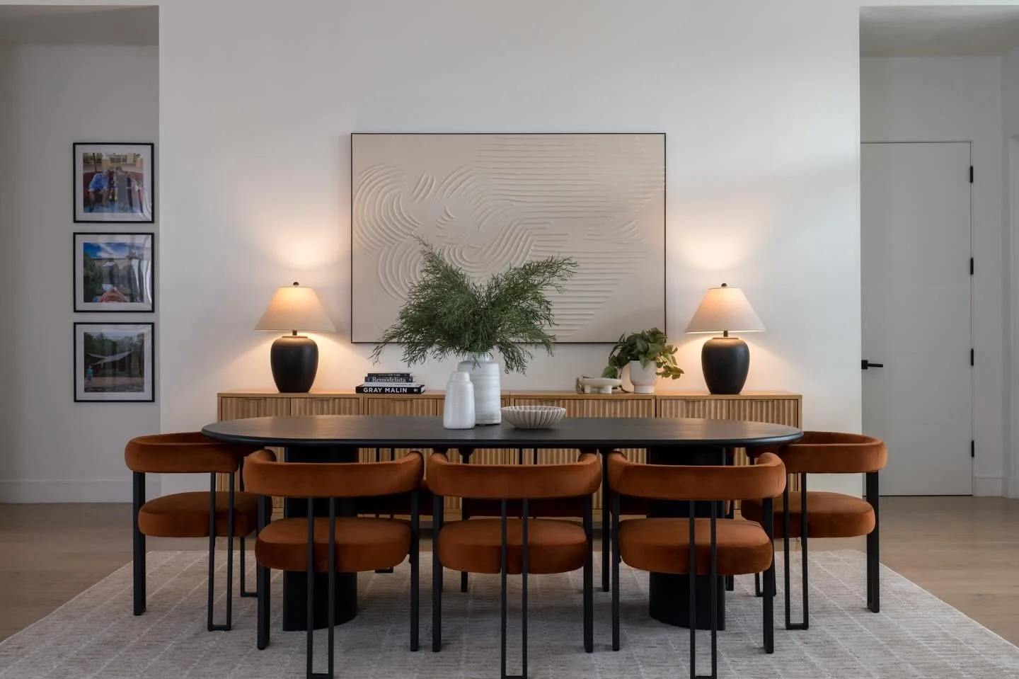 Constructed in 2019, this developer-built home featured soaring ceilings and generous scale but lacked warmth and personality. Cut to a handful of years later when our clients purchased it, our layered furnishing and styling approach (along with some