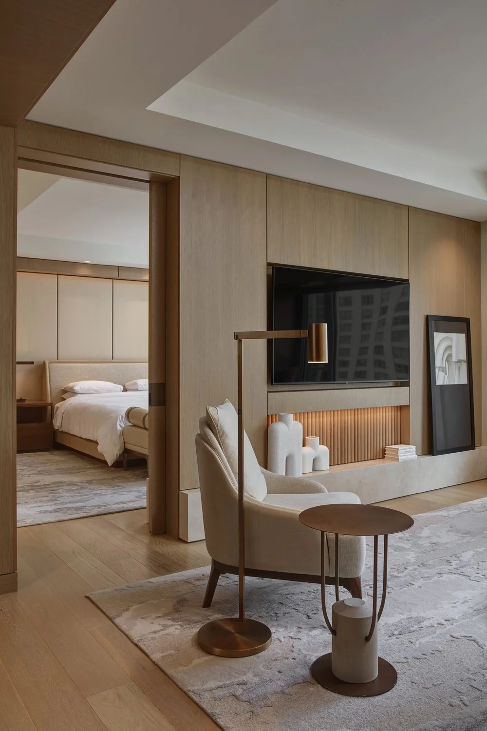 Curated hotel art program luxury hospitality guest room suites