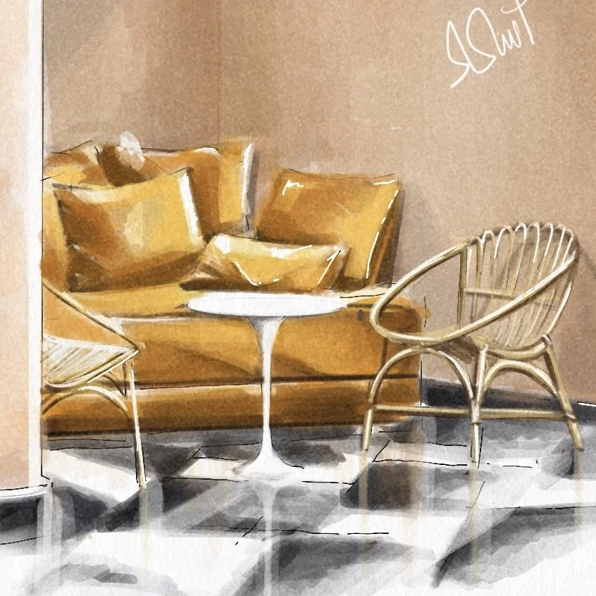 A cozy corner with a mustard-colored sofa, a white round side table, a rattan chair, and mustard-colored pillows, set against a tan wall with a signature in the upper right corner.