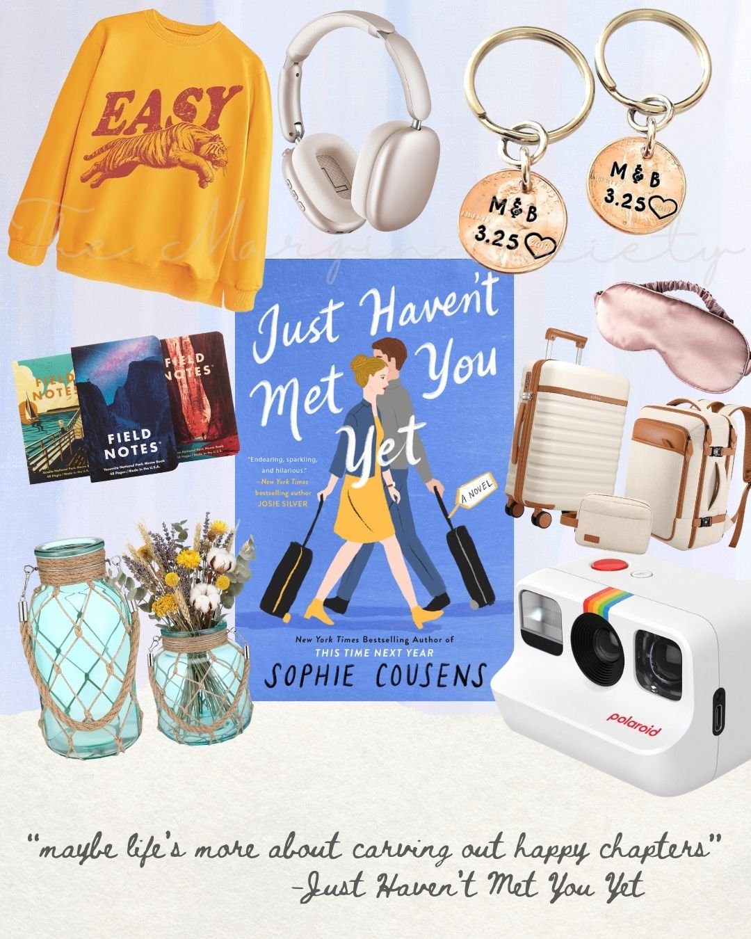 Book cover titled "Just Haven't Met You Yet" by Sophie Cousens surrounded by various travel and everyday items including a yellow sweatshirt, white headphones, gold hoop earrings, a sleep mask, two lanterns with flowers, two small books titled "Field Notes," a small suitcase, a backpack, a Polaroid camera, and a pink sleep mask.