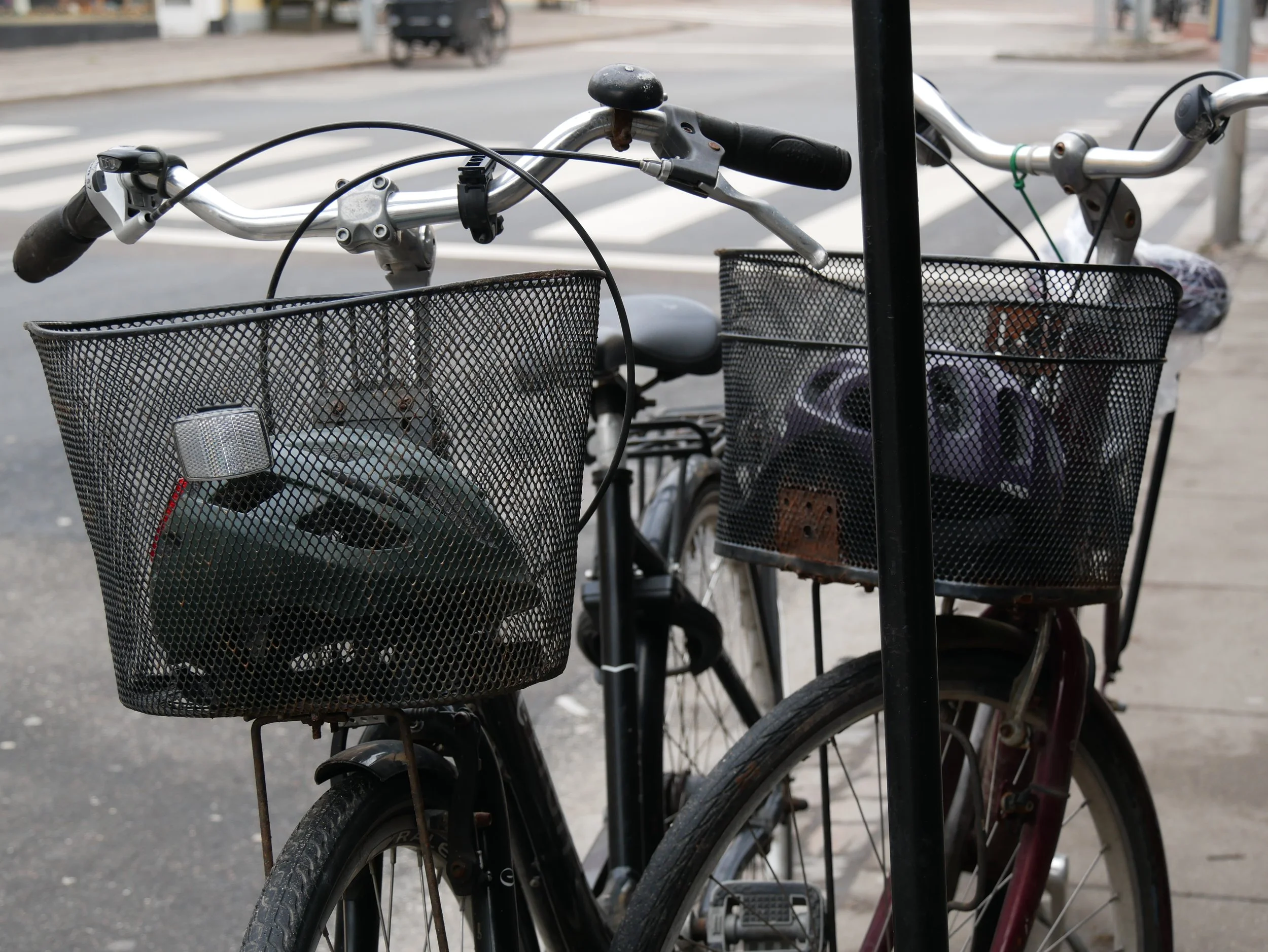 two bikes and two helmets - 2025 - Digital photograph
