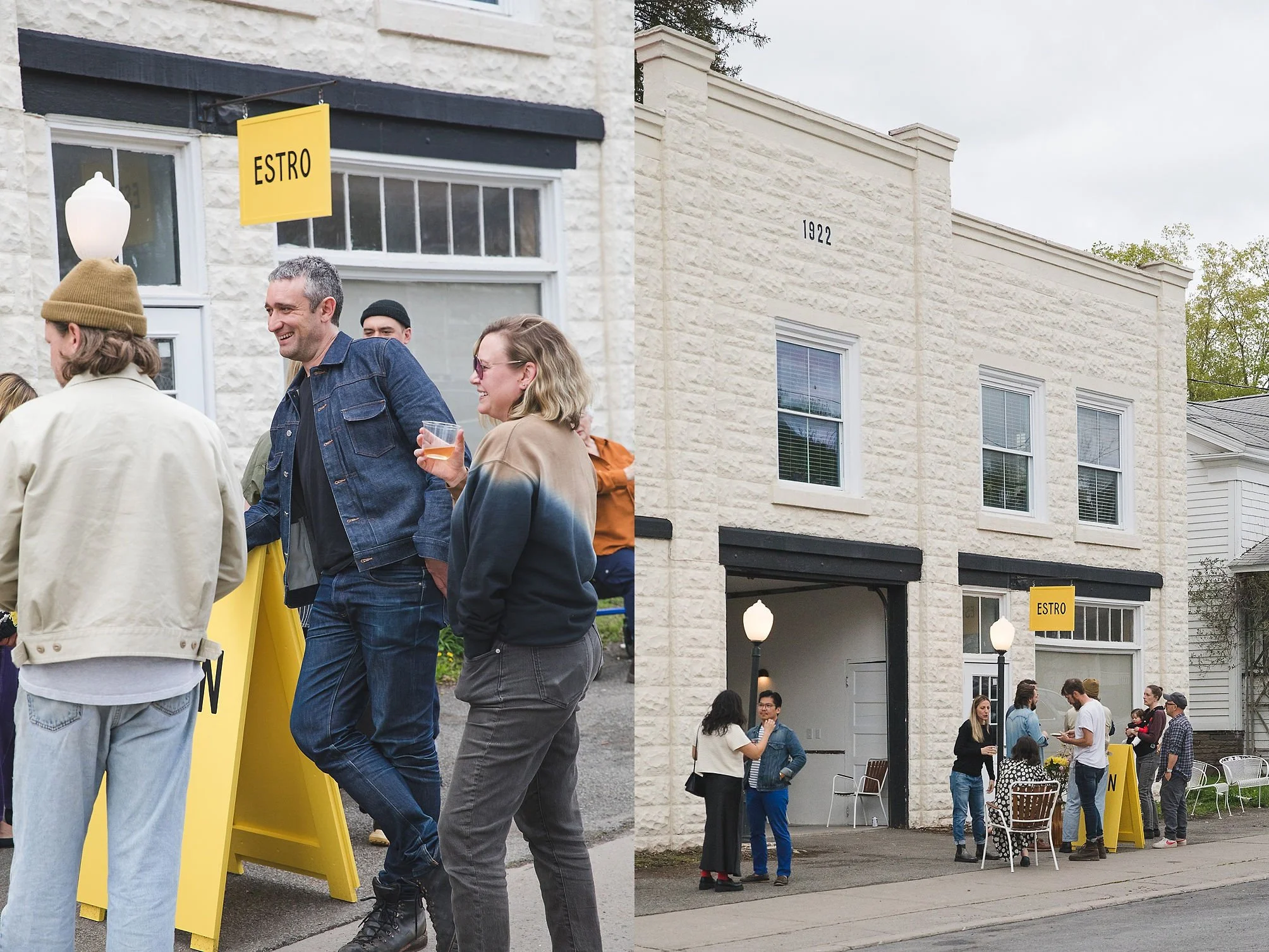 People gathered outside a building with a yellow sign that says 'ESTRO.' Some individuals are talking, holding drinks, and sitting at outdoor tables. The building has white brick walls and multiple windows.