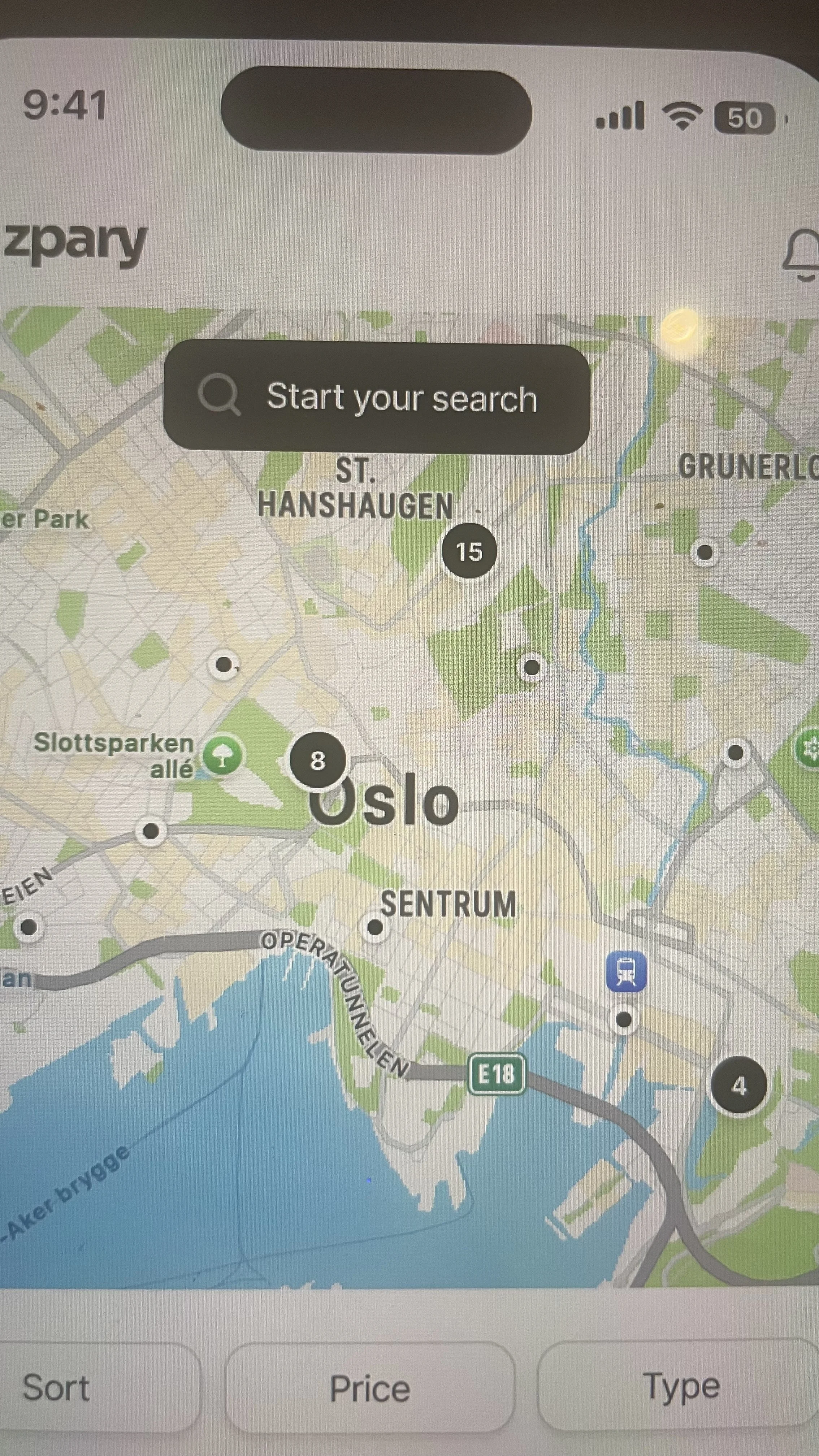 Picture of a digital map overlooking Oslo. Black dots with white rims are spread throughout the map, with one large dot with the number 8 in the middle.