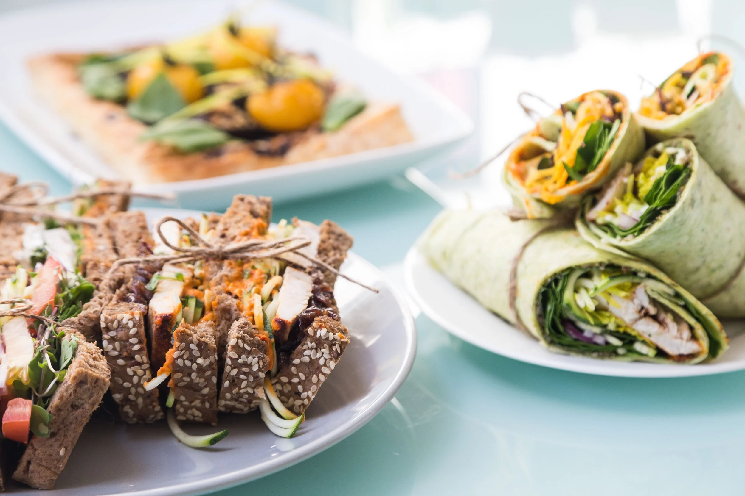 Catered business meeting lunch featuring fresh sandwiches, wraps and savouries