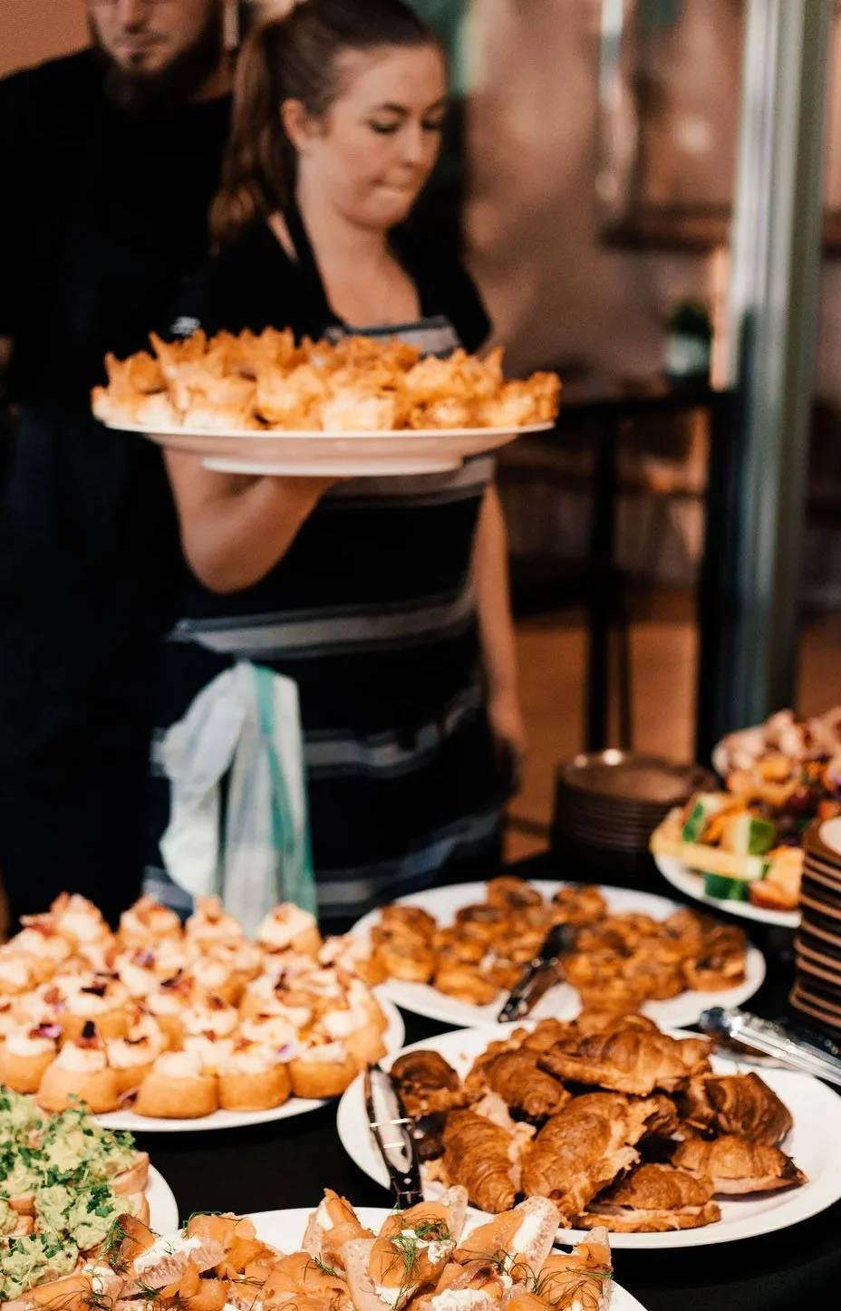 Corporate event catering display with a selection of freshly prepared food for guests. Fully staffed and serviced.