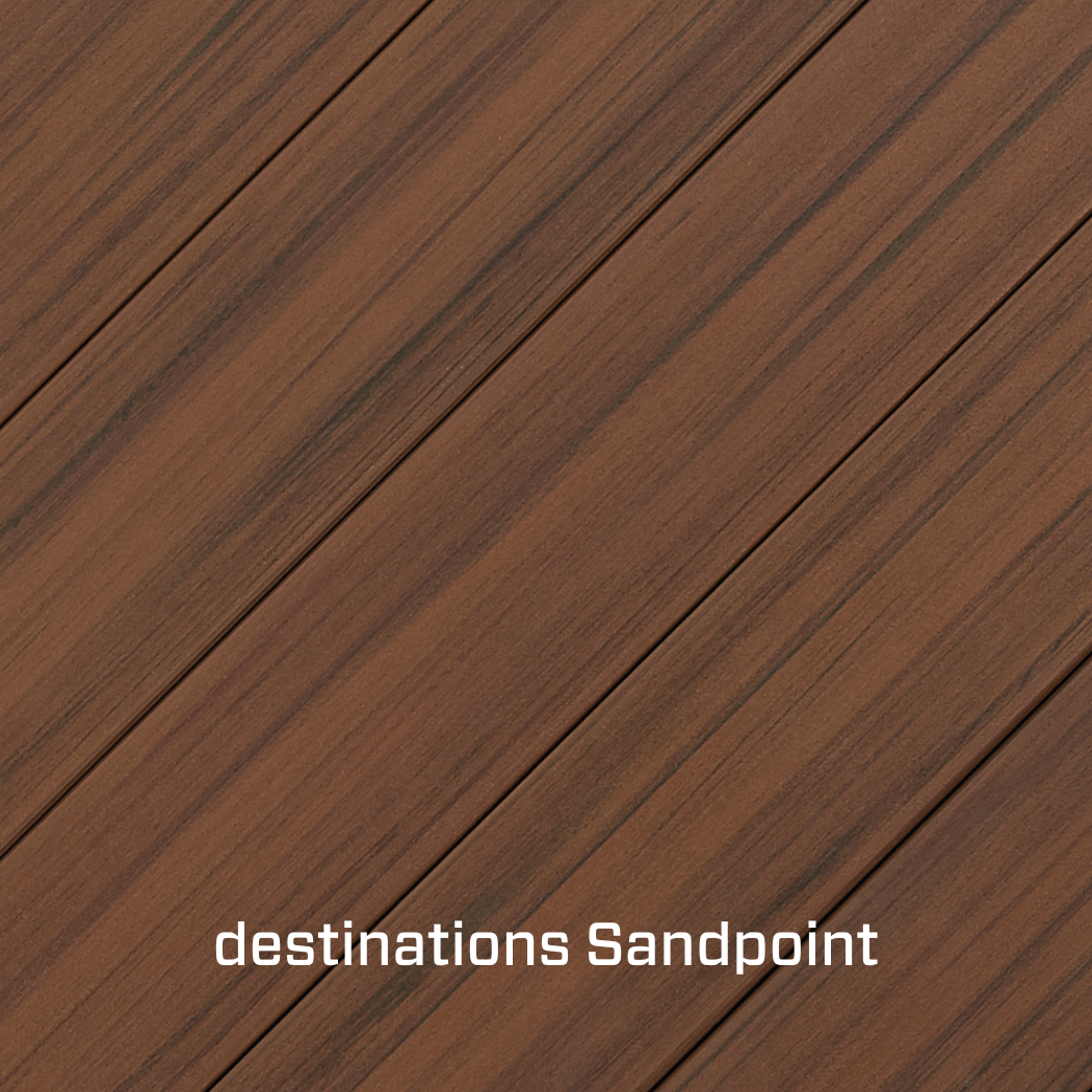 Close-up of wooden planks in a diagonal arrangement with the text 'destinations Sandpoint' at the bottom.
