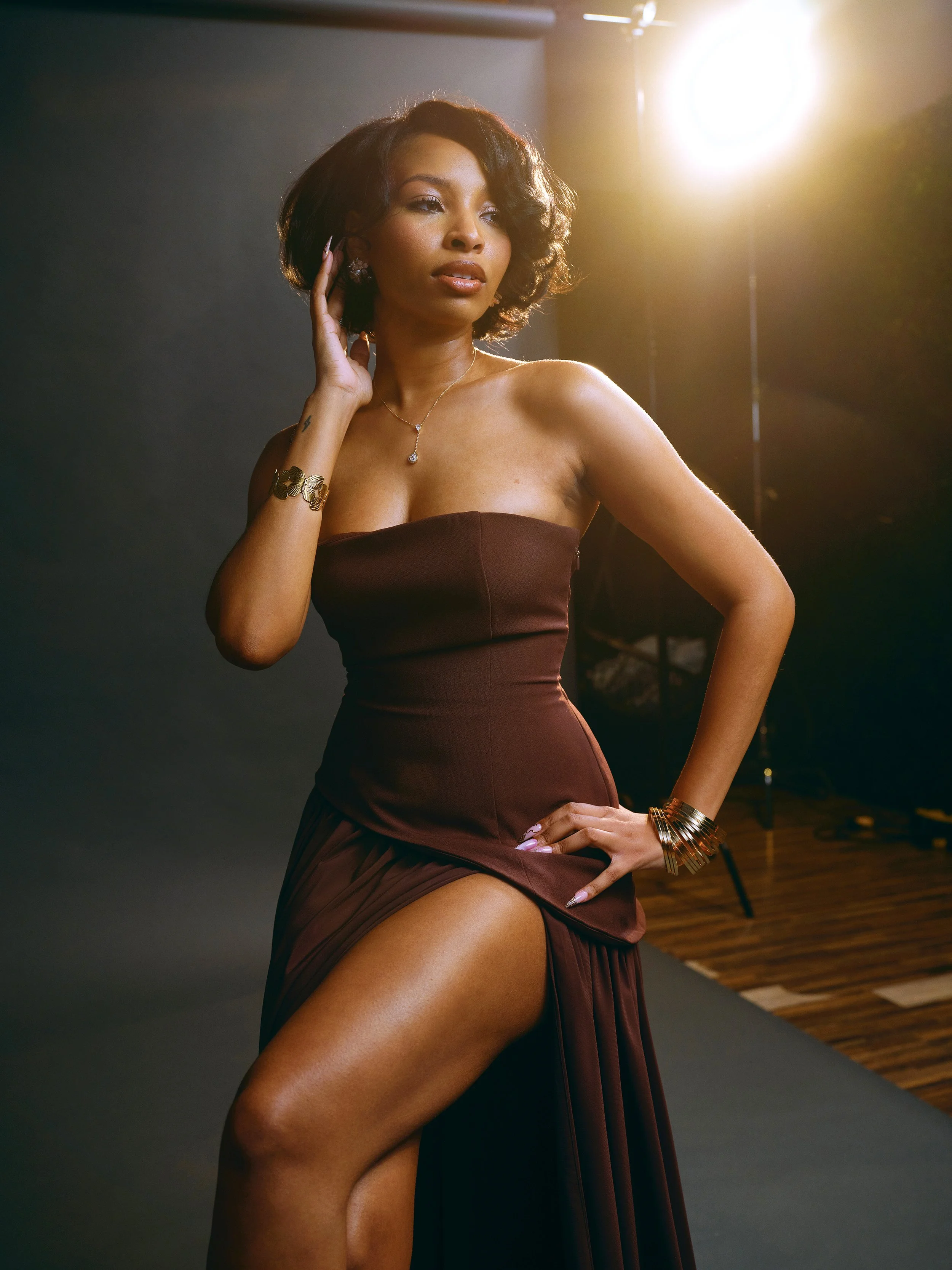 Old Hollywood-style studio portrait of Ria Freeman, host of the Late Bloomers Podcast, photographed with dramatic cinematic lighting.