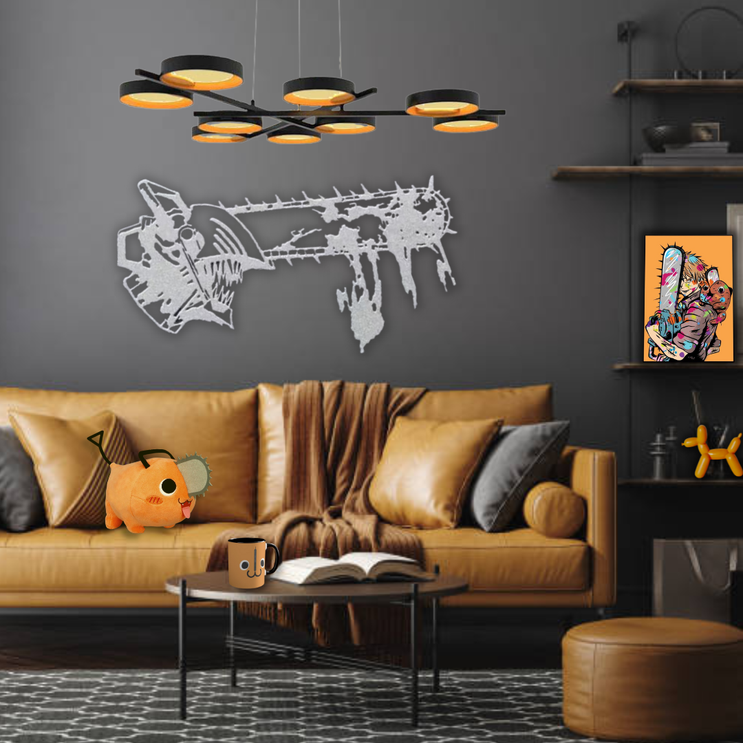 Modern living room with a mustard-colored sofa, black and gray dool pillows, and a small coffee table with a cup and open book. There is a plush orange plush toy with a face and a carved number "2" on it on the sofa. Dark gray wall with a white graff