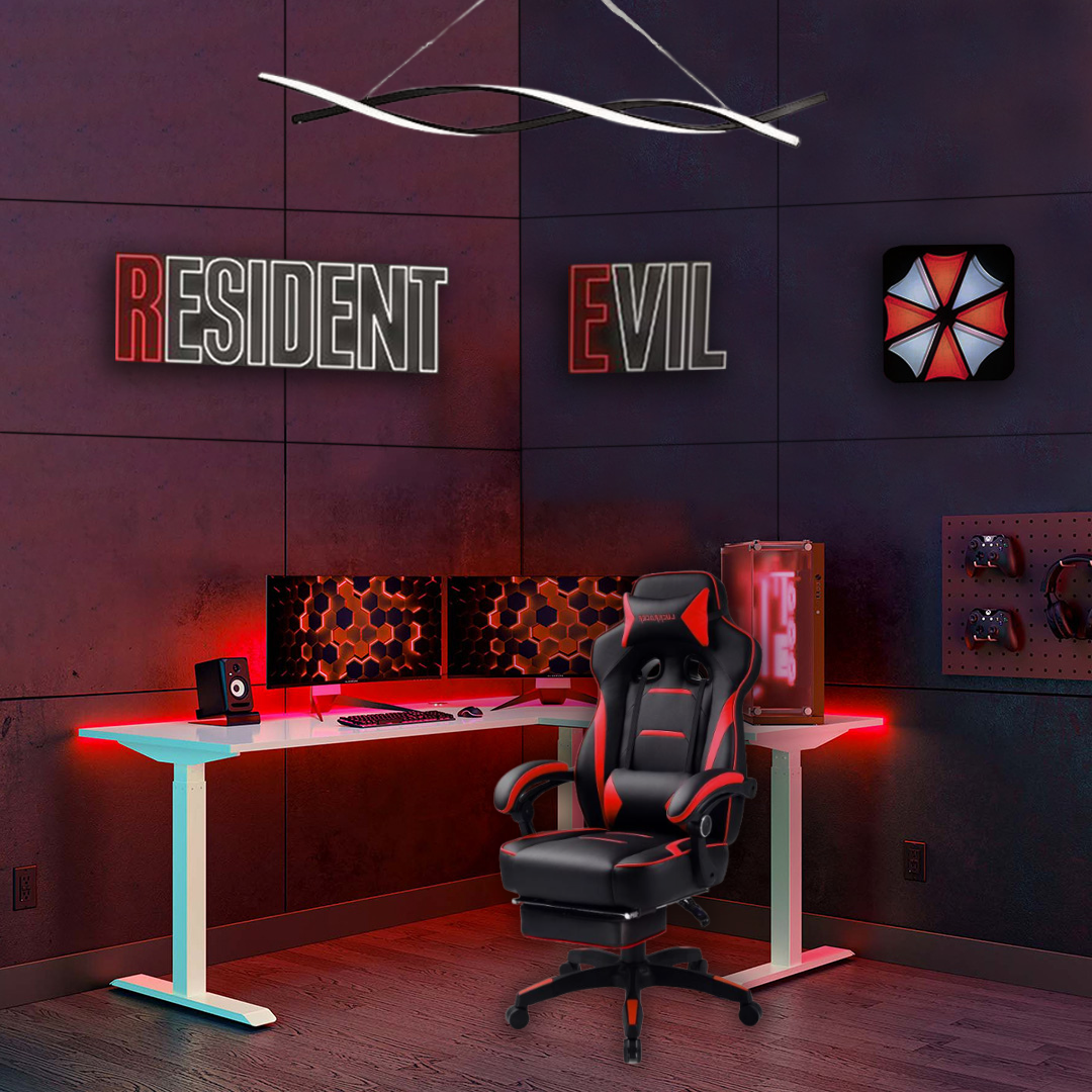 A gaming room with a black and red gaming chair, a white desk with three monitors, a keyboard, and a mouse. The room has dark walls with neon signs that say "Resident Evil" and the Umbrella Corporation logo. There are gaming controllers and headphone