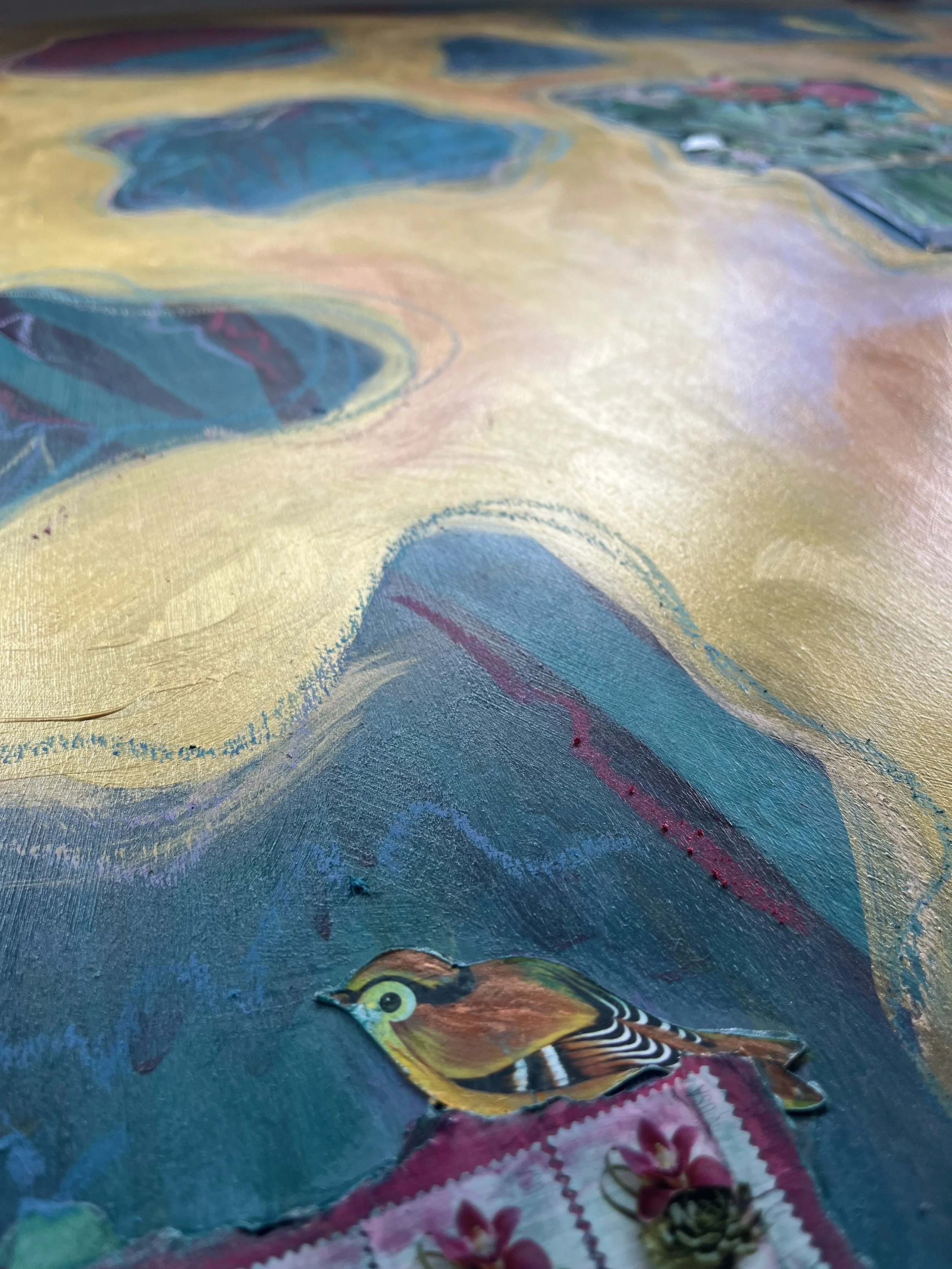 Close-up of collage, including a bird, postage stamps, floral patterns, and abstract designs, with layered textures and vibrant hues.