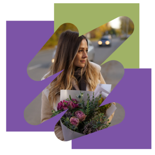 A woman holding a bouquet of pink and purple flowers, standing outdoors with cars in the background, edited with purple and green geometric overlays.