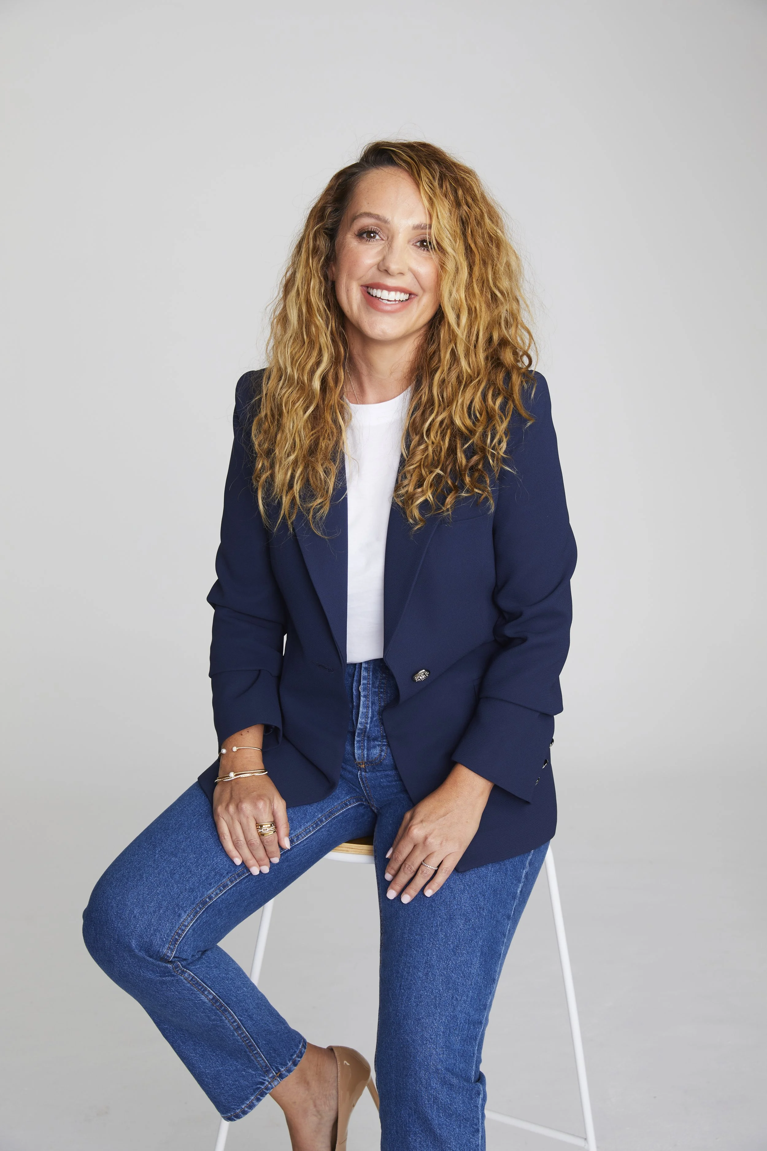 Es Leibig, fractional HR director and founder of People Centred Group, seated in navy blazer