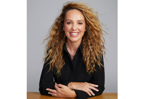 Es Leibig, senior HR consultant and founder of People Centred Group, smiling with arms crossed