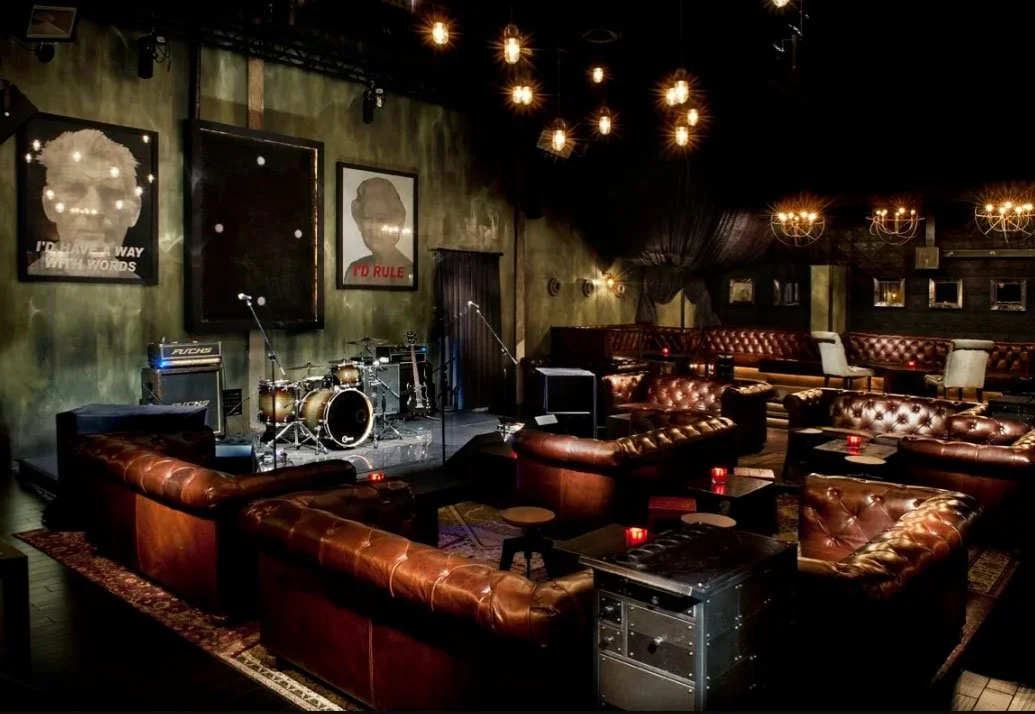 Sayers Club Hollywood interior design by Kelly Architects featuring intimate lounge seating and performance stage