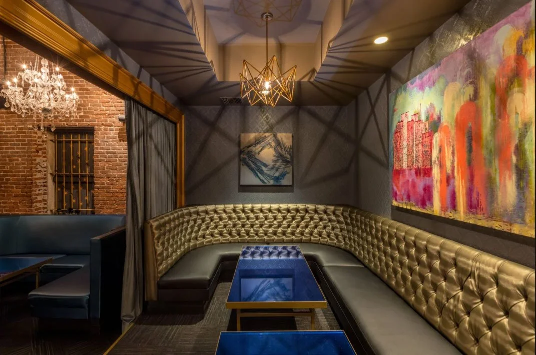 Interior of Mama Lion featuring luxurious finishes, intimate lounge seating, and warm layered lighting.