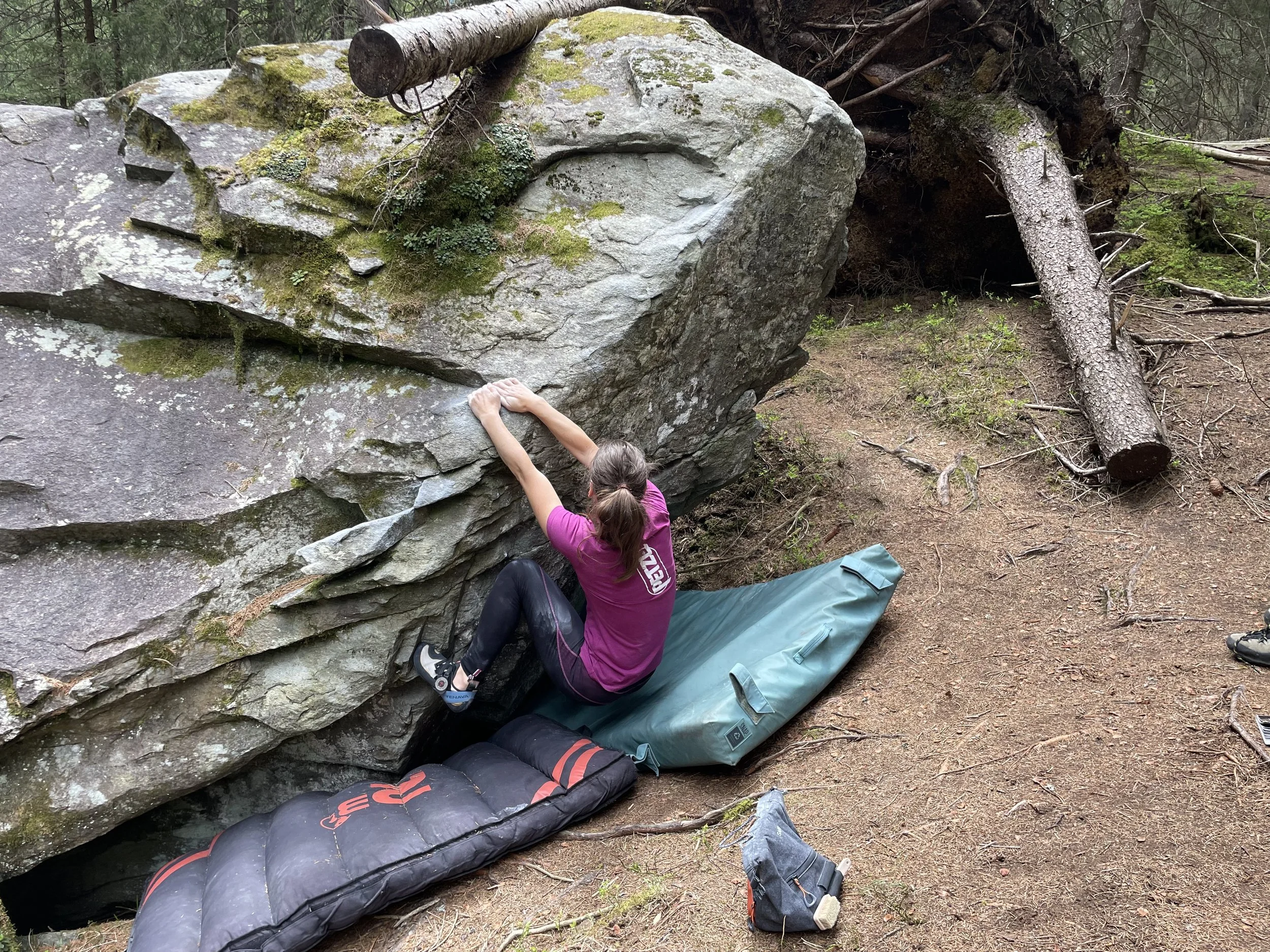Woman Climbing on a Boulder in Magic Wood, Switzerland