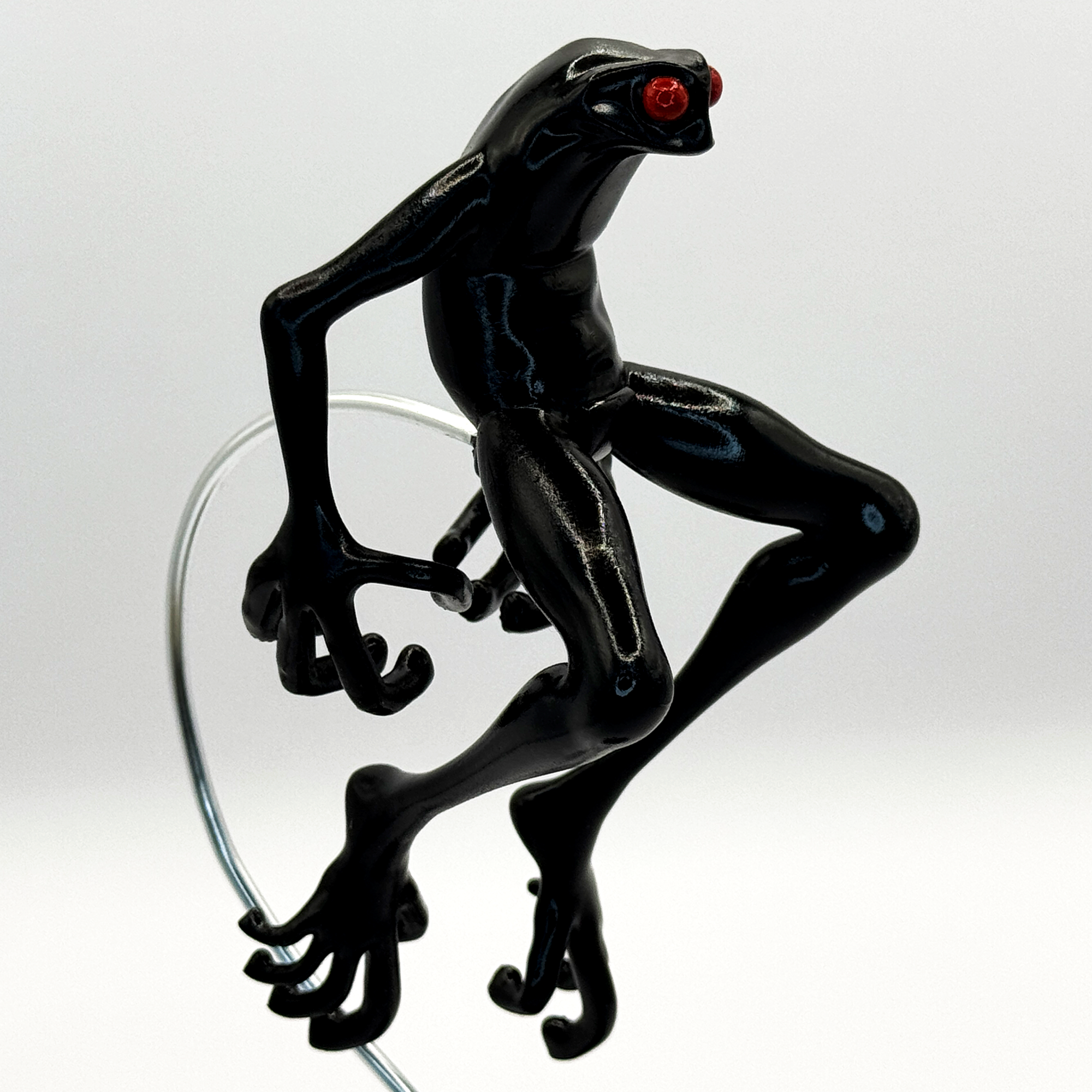 fan art figure black frog with red eyes