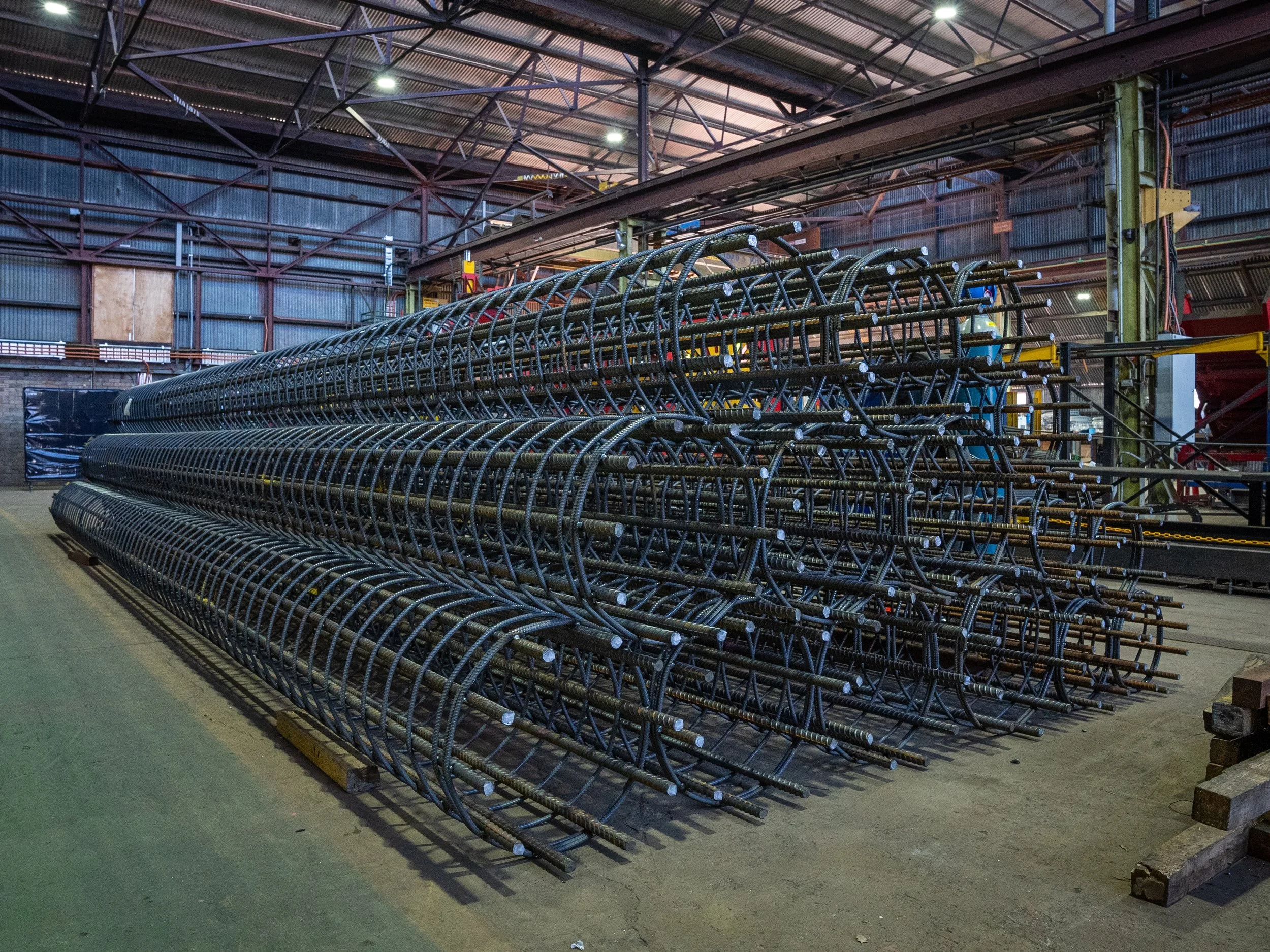 Prefabricated reinforcement pile cages in Carrabay workshop ready for infrastructure projects.