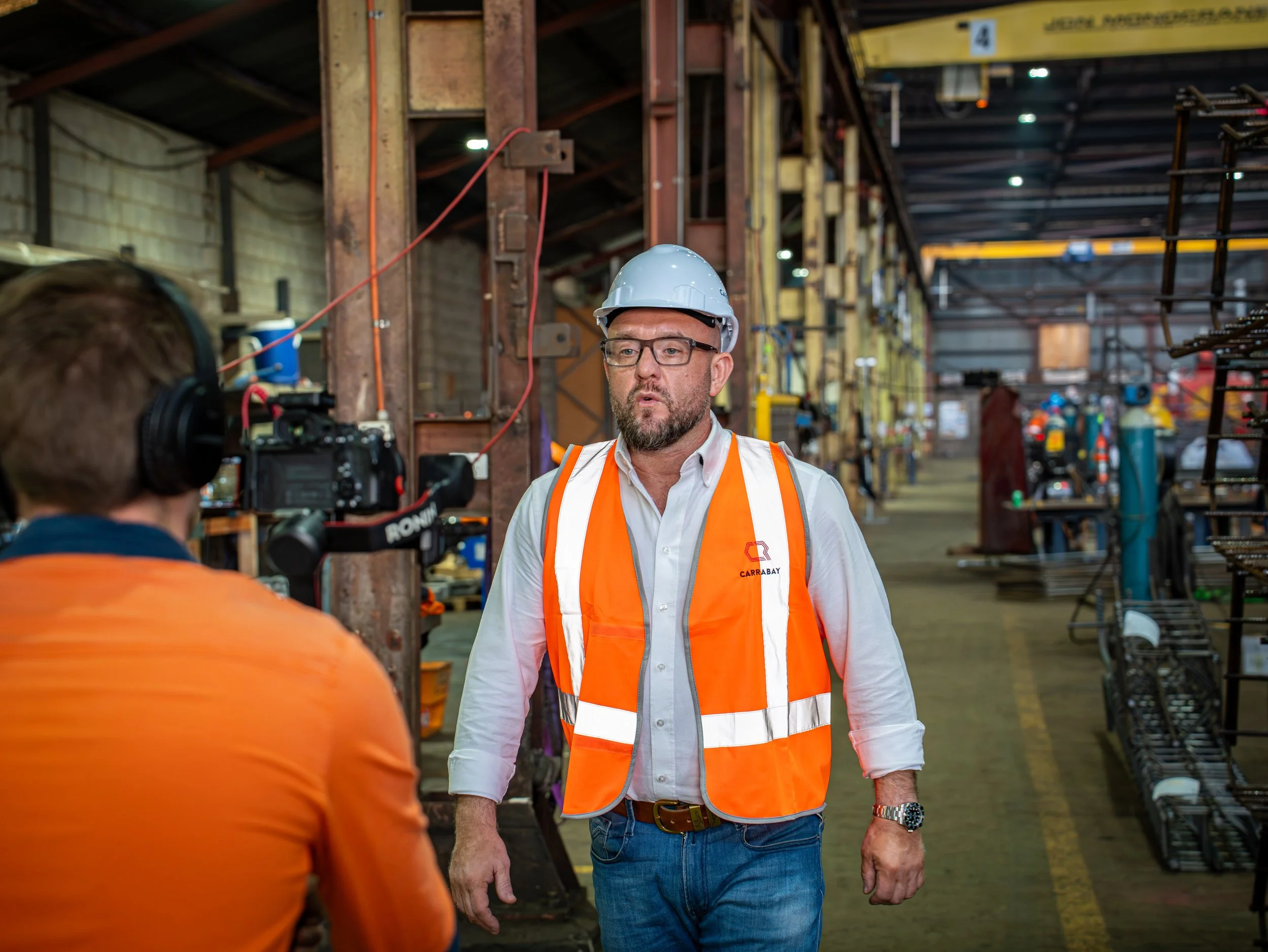 Workshop filming of Carrabay team member discussing engineering and fabrication projects.