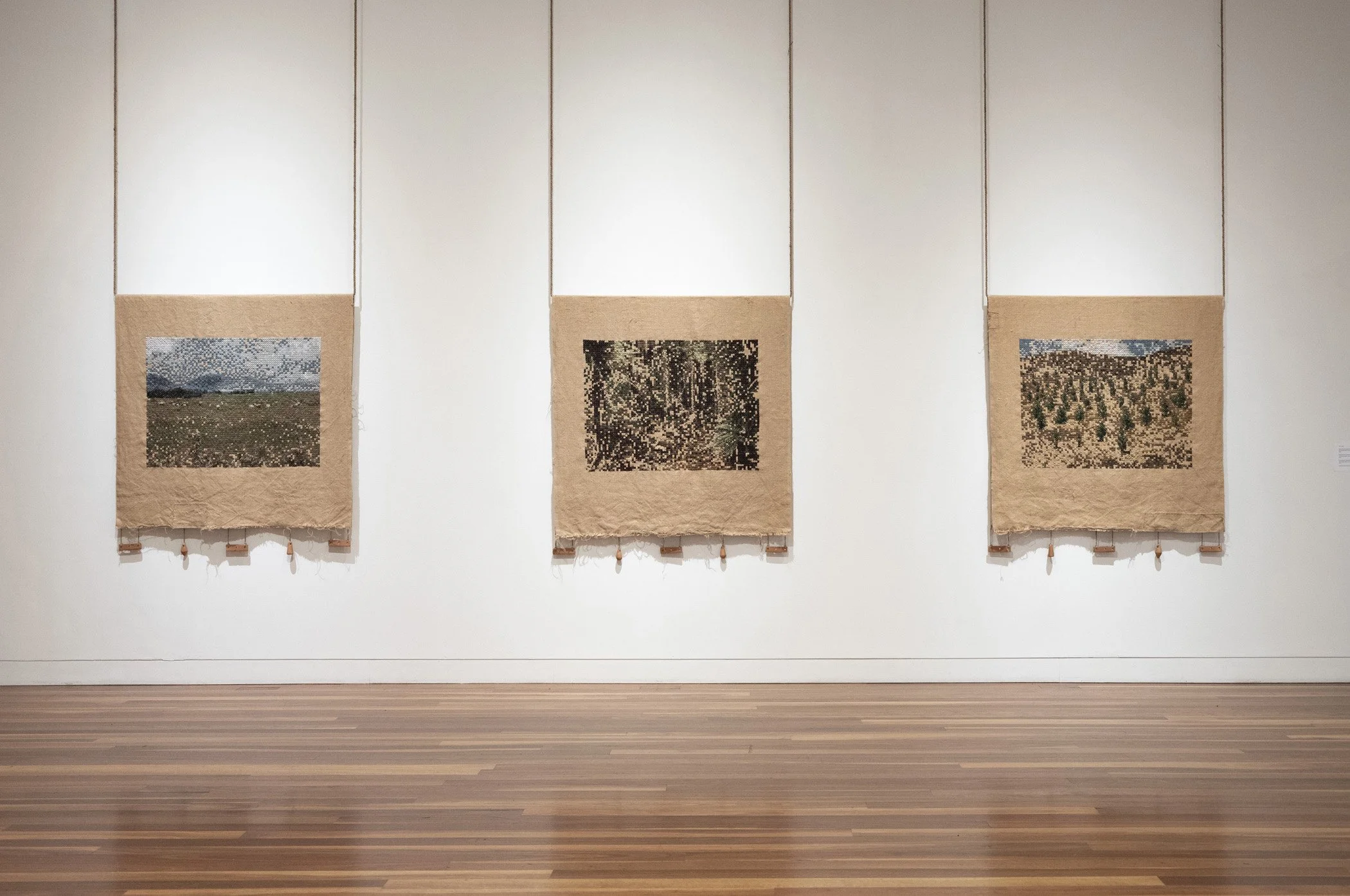 Improvement (production). 2026.
Improvement (regeneration). 2026.		
Improvement (diversification). 2026.
Jute hessian fabric, wool, hand-formed papa clay, aluminium tube, jute twine.
120 x 130 cm.
Photo: Shaun Matthews.