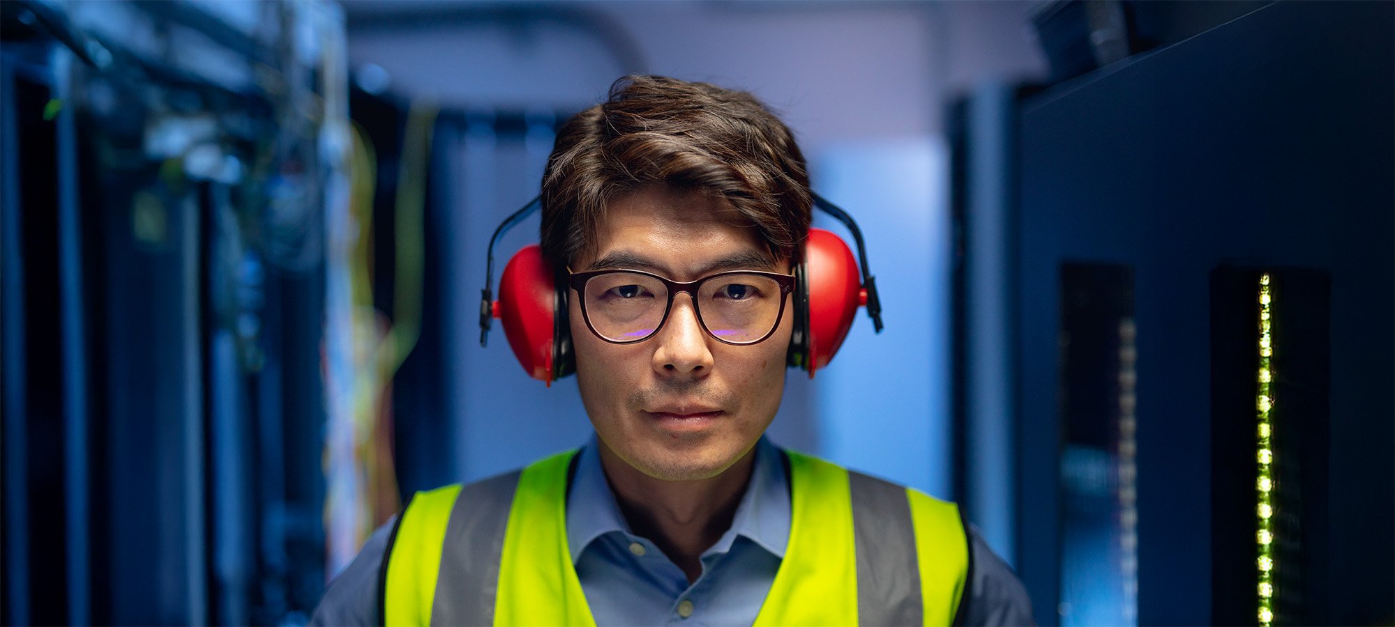 portrait-of-asian-male-engineer-wearing-ear-plugs-2025-04-03-01-11-22-utc.jpg