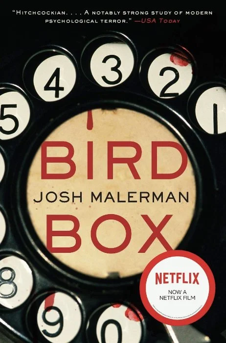 Cover for Bird box by Josh Malerman. Close up of an old-school rotary phone.