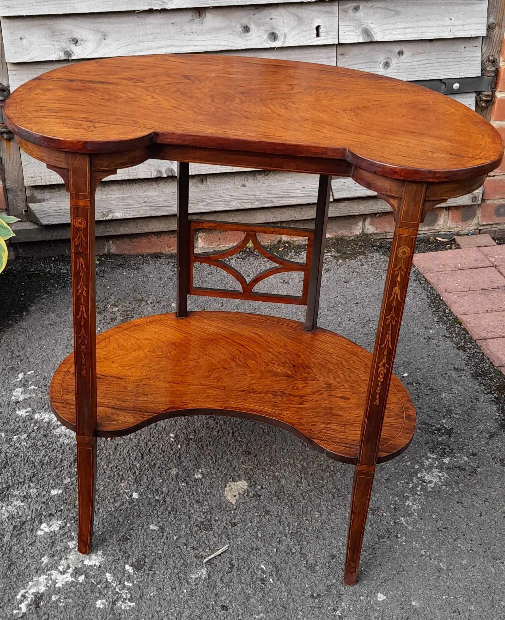 Edwardian Mahogany  Kidney shaped occasional table with boxwood inlay.