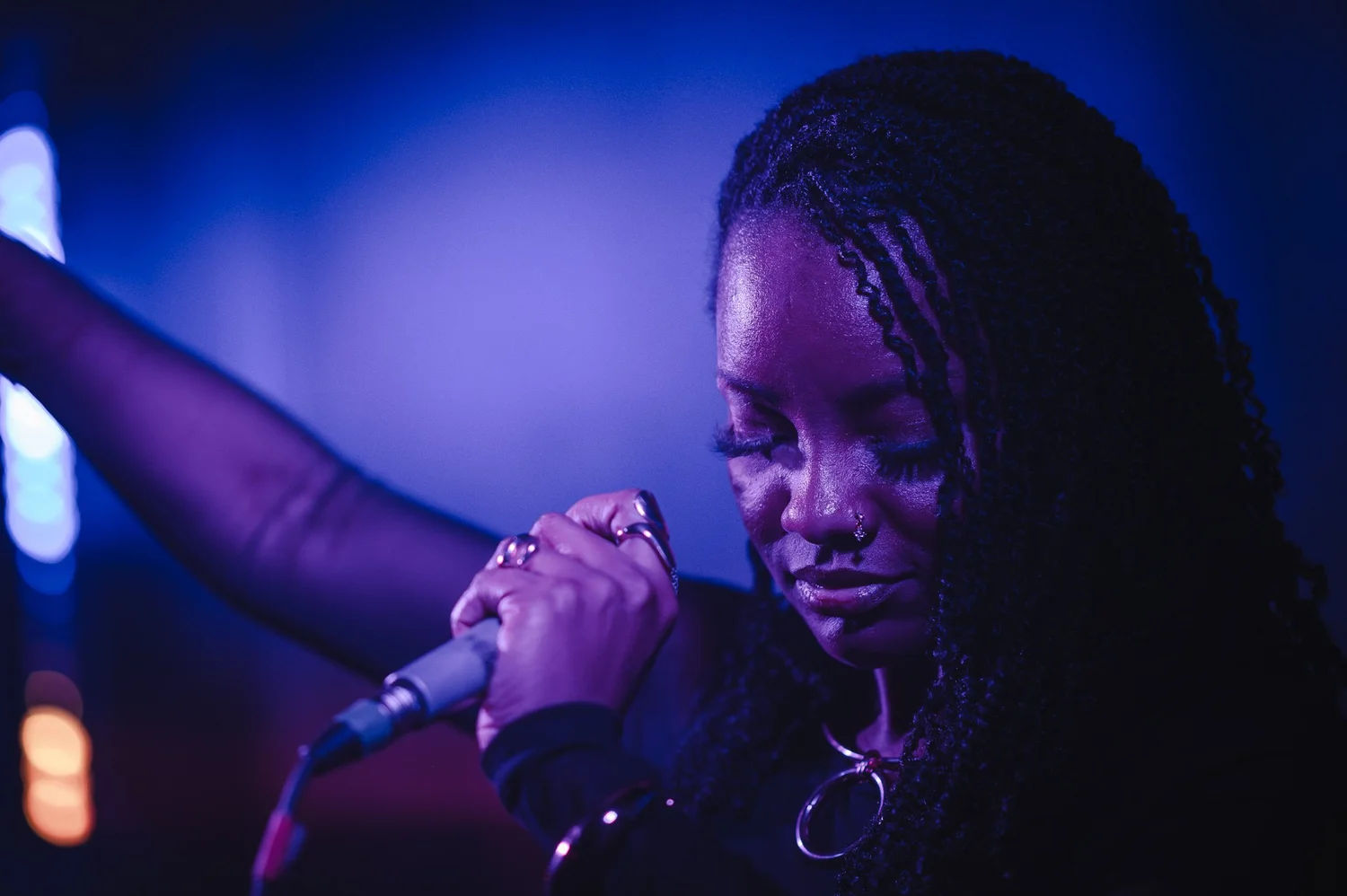 Uju performing on stage