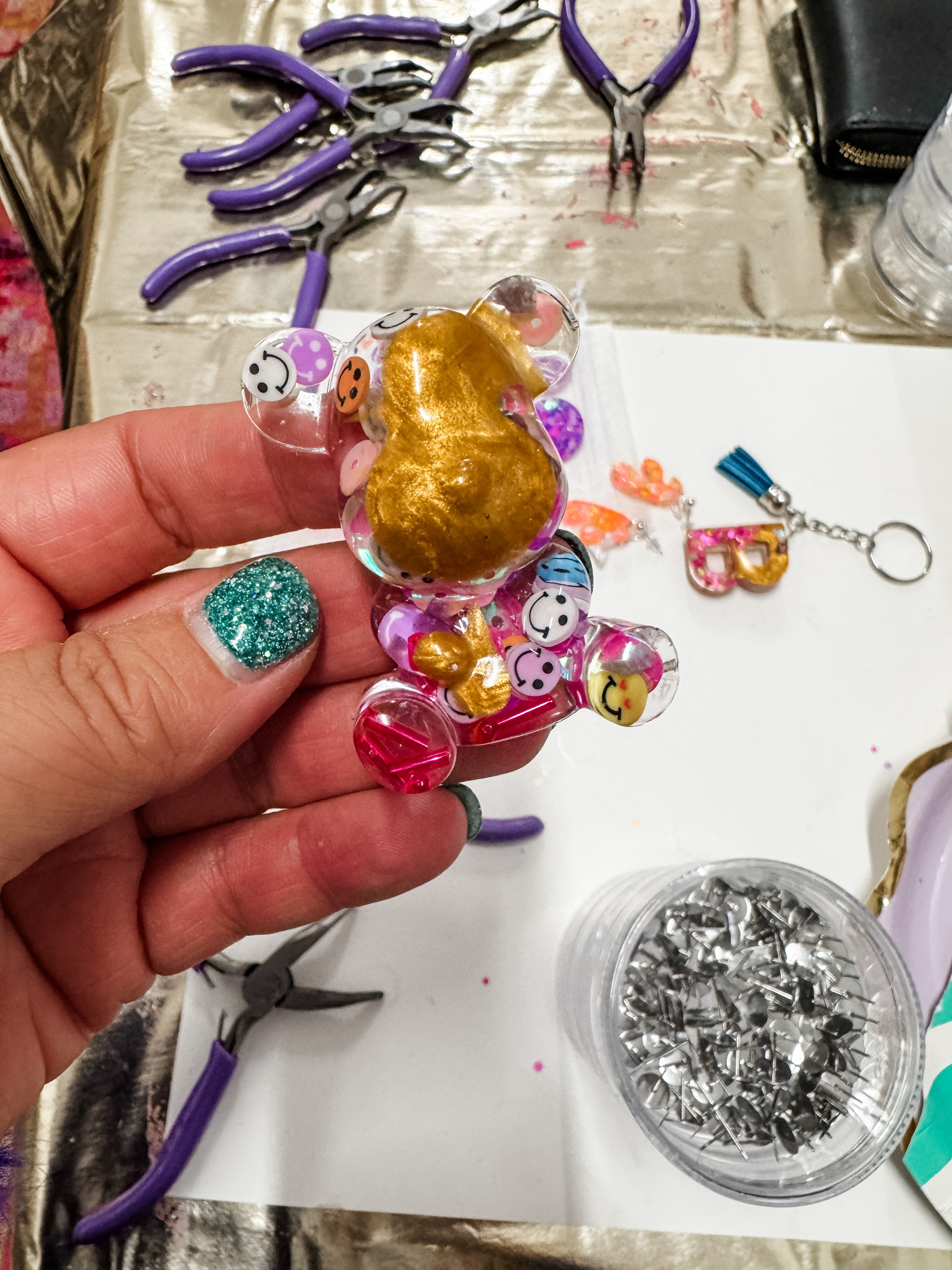 a glittery teddey bear made in the uv reson tween worlshop