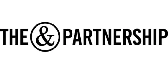 Logo with the text 'The & Partnership' in black font.