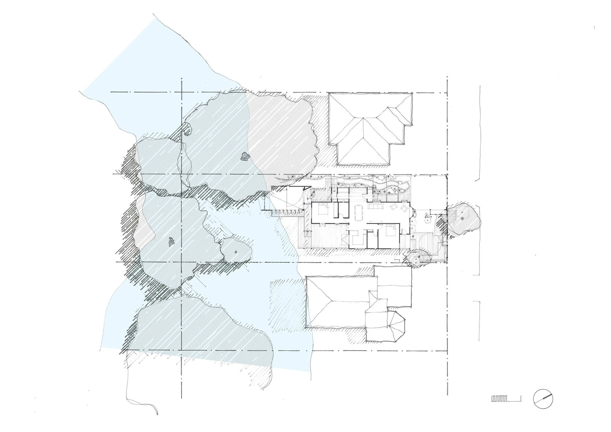 Architectural site plan illustrating a residential floor plan surrounded by a light blue water feature, dense shaded trees, and neighboring buildings, all on a grid.