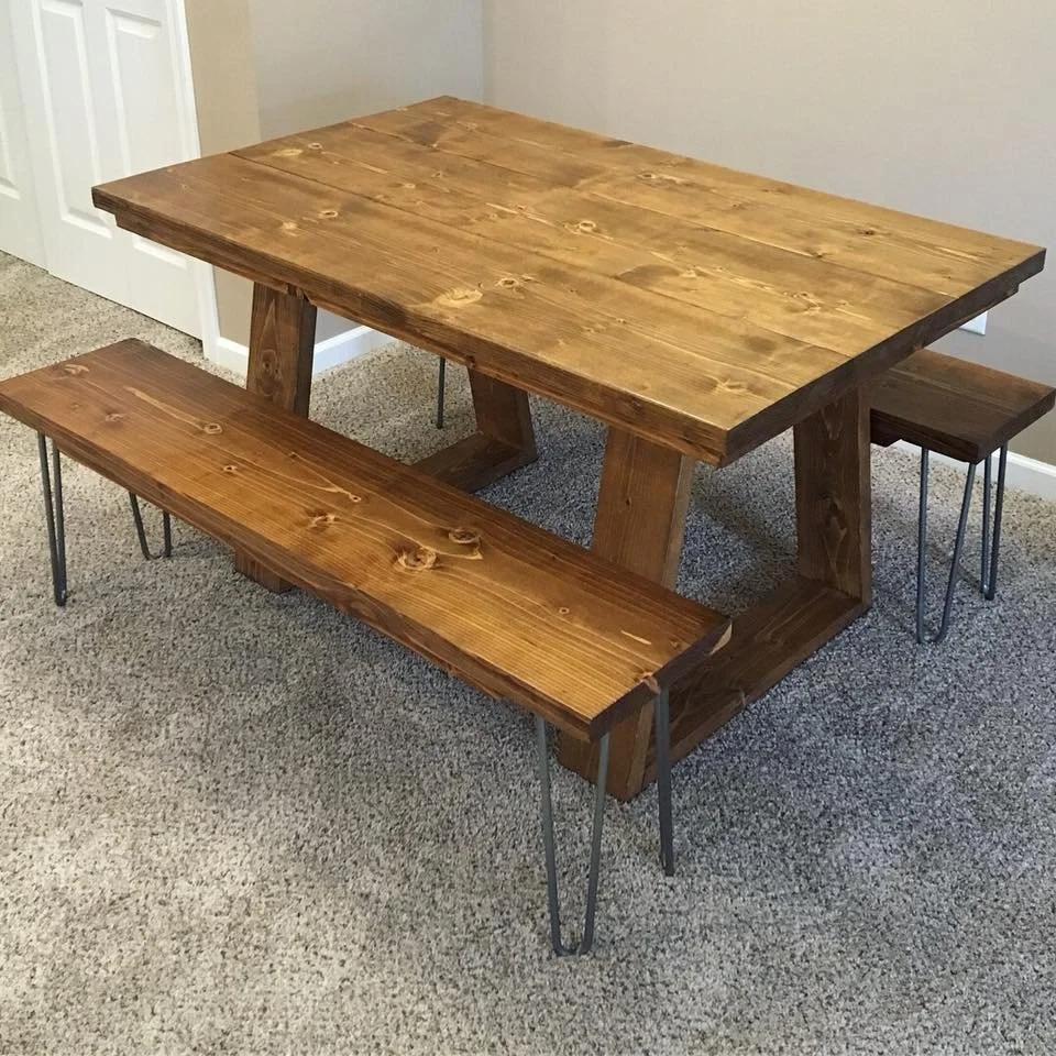 Dining table with angled legs, hairpin bench, stained