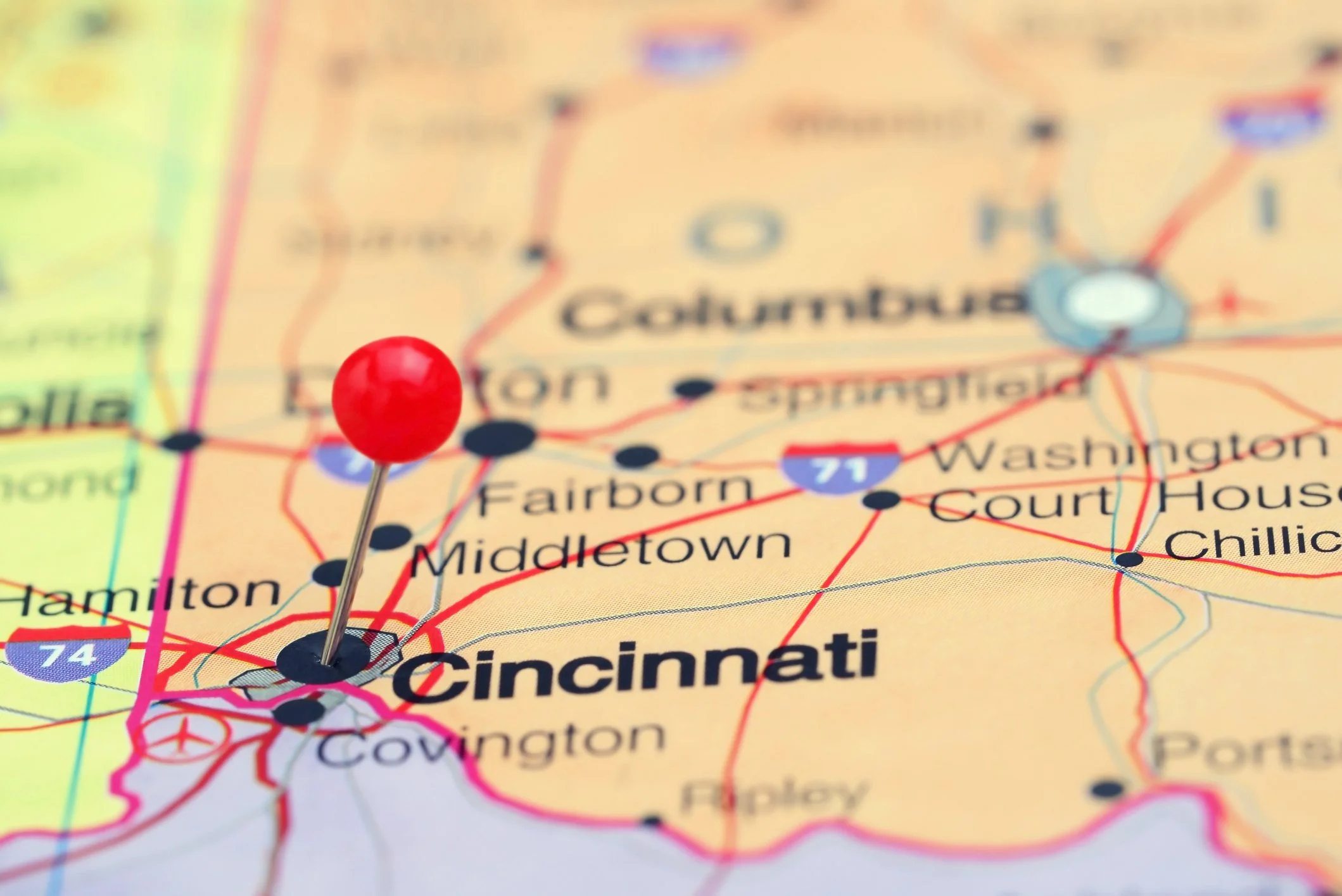 Close-up of a map of Cincinnati, Ohio, with a red pin marking Cincinnati. Other nearby cities such as Middletown, Fairborn, and Washington Court House are visible.
