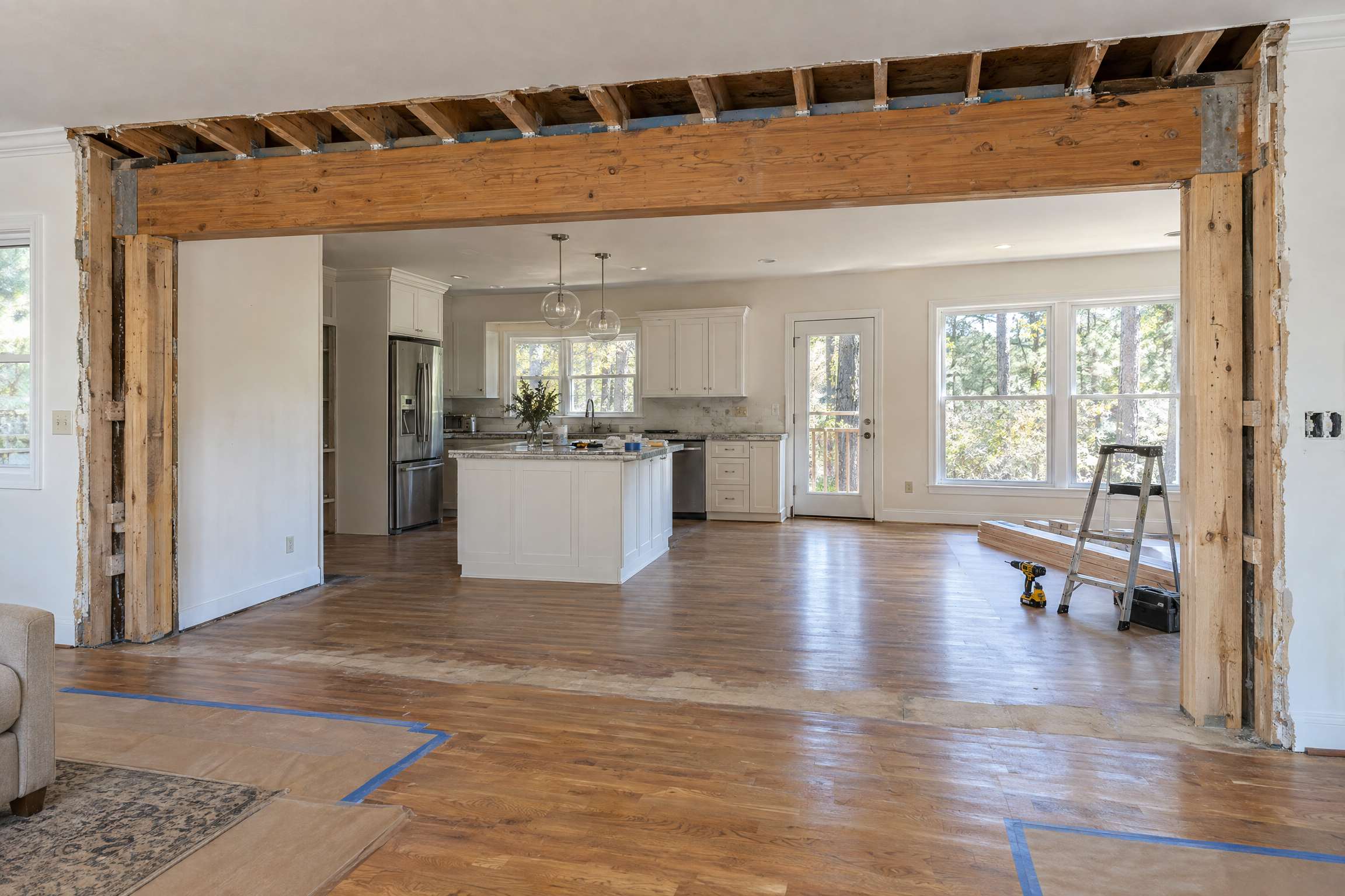 Load-bearing wall removed and replaced with a structural beam and posts during a kitchen remodel in Raleigh, NC