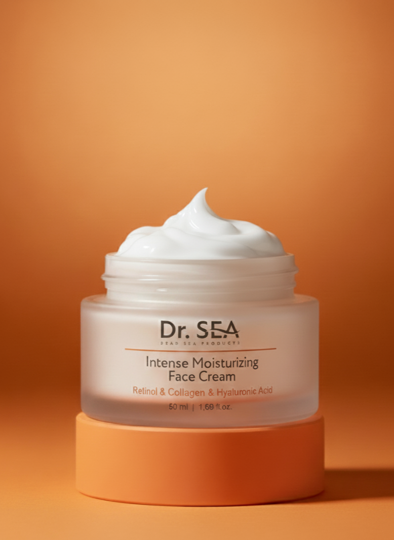 A jar of Dr. SEA Intensive Moisturizing Face Cream with a dollop of cream on top, placed on a peach-colored platform against an orange background.