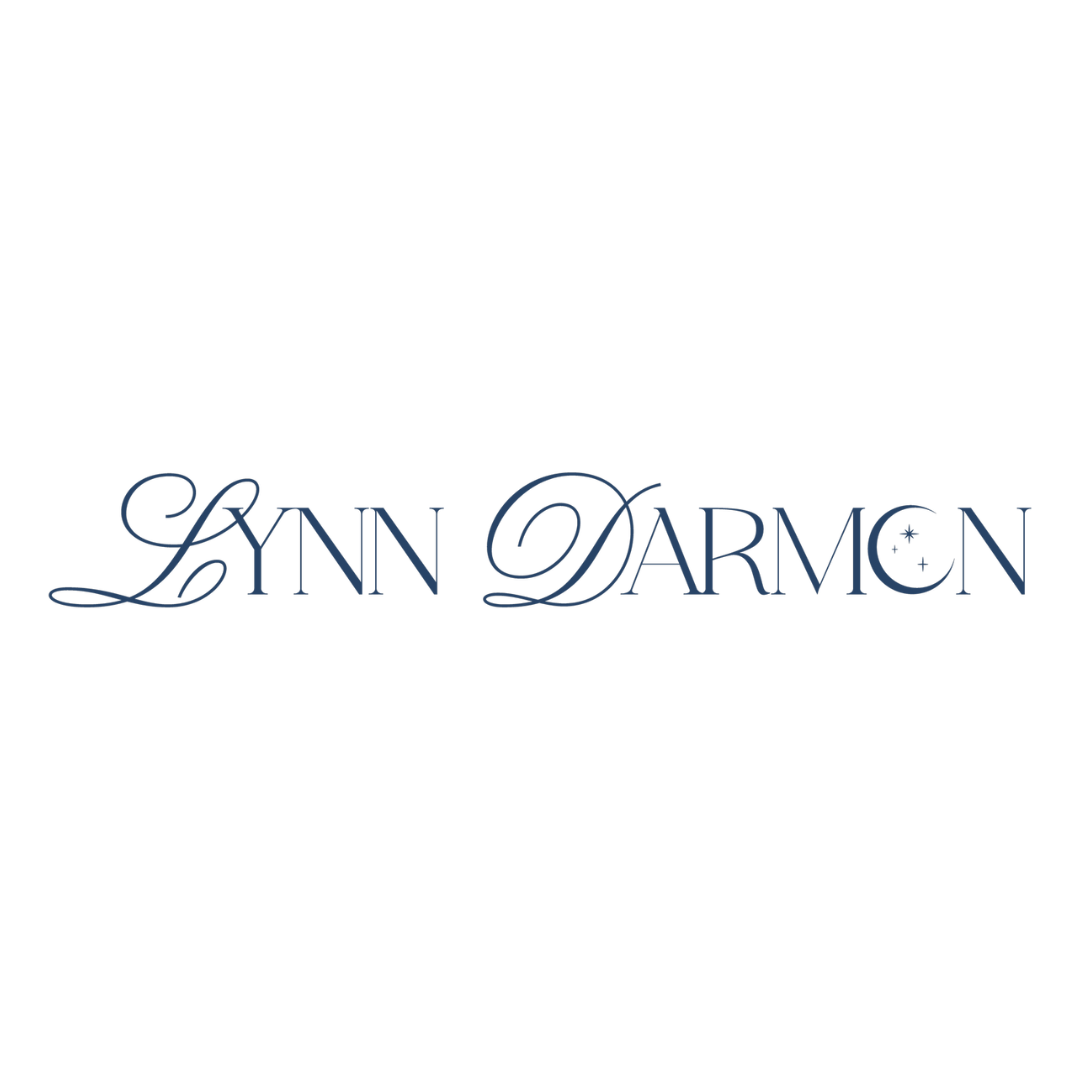 Lynn Darman logo in elegant script with star accents.